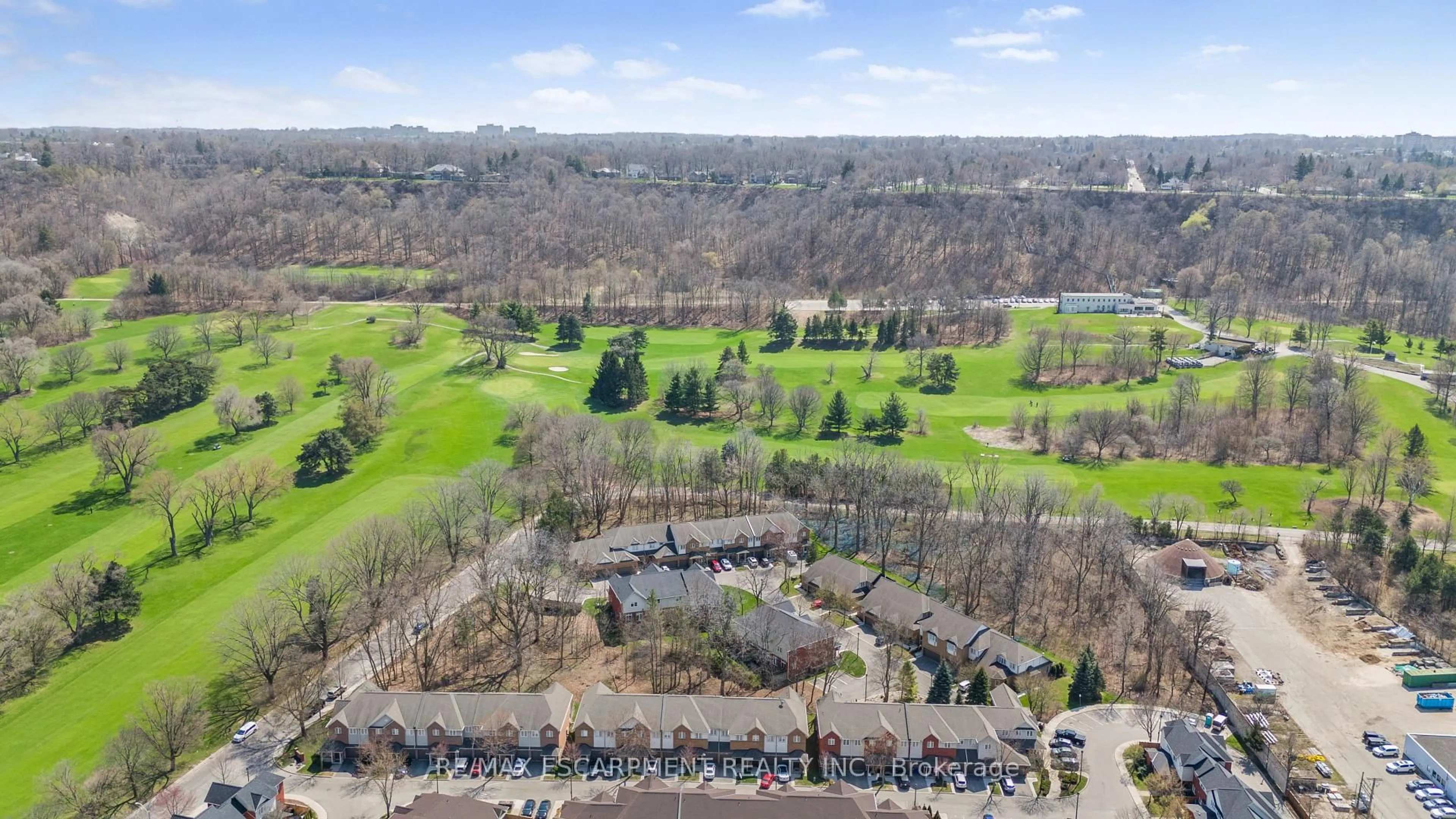 A pic from outside/outdoor area/front of a property/back of a property/a pic from drone, water/lake/river/ocean view for 100 Beddoe Dr #110, Hamilton Ontario L8P 4Z2