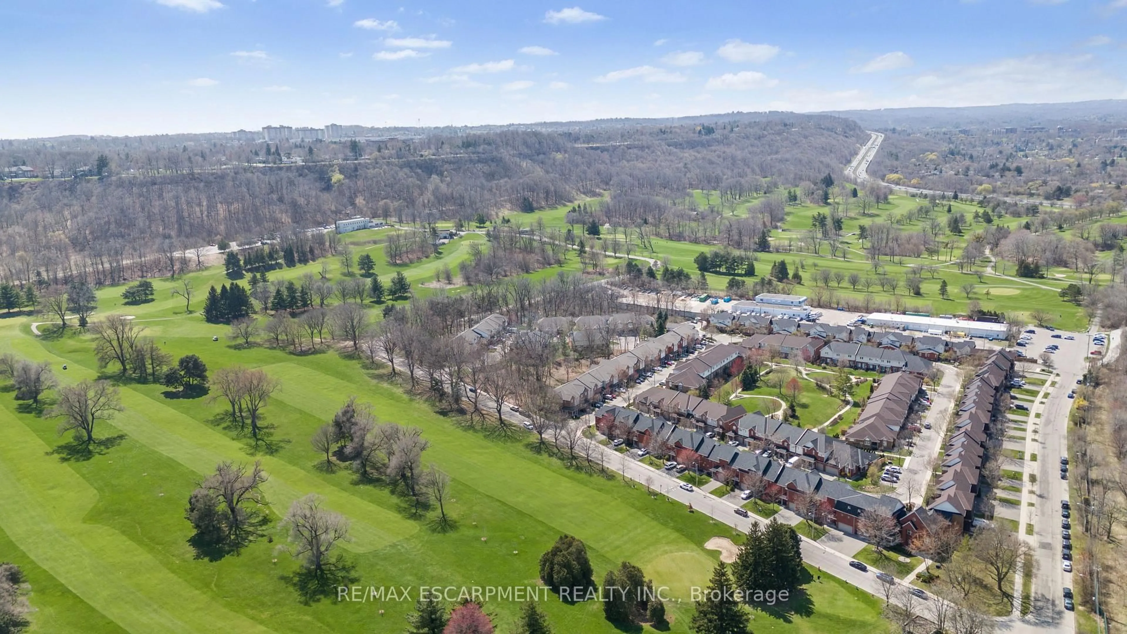 A pic from outside/outdoor area/front of a property/back of a property/a pic from drone, unknown for 100 Beddoe Dr #110, Hamilton Ontario L8P 4Z2