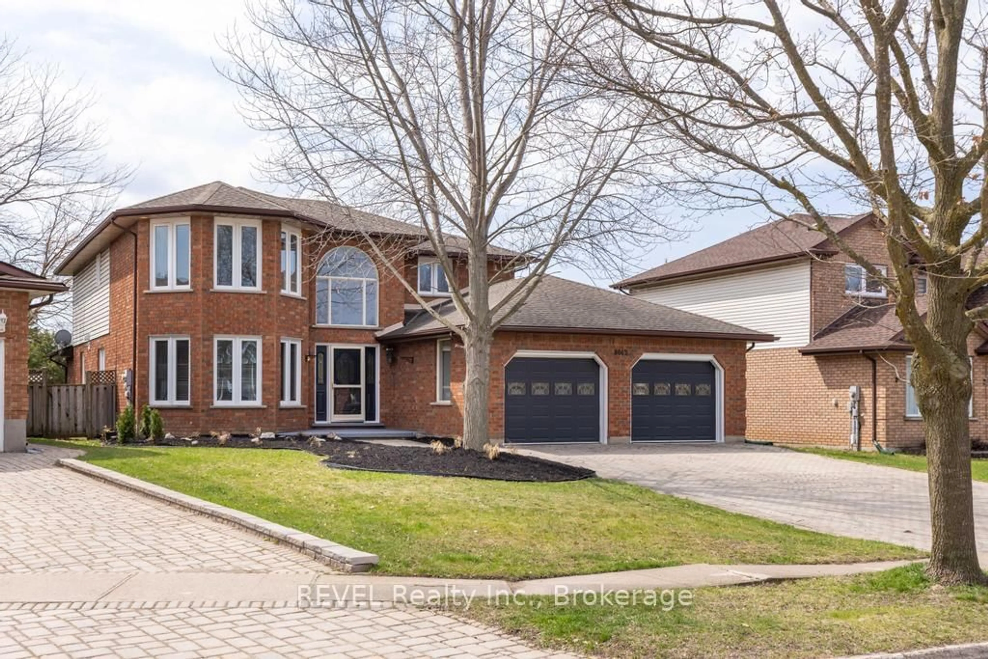 Home with brick exterior material, street for 8042 Oakridge Dr, Niagara Falls Ontario L2H 2W1
