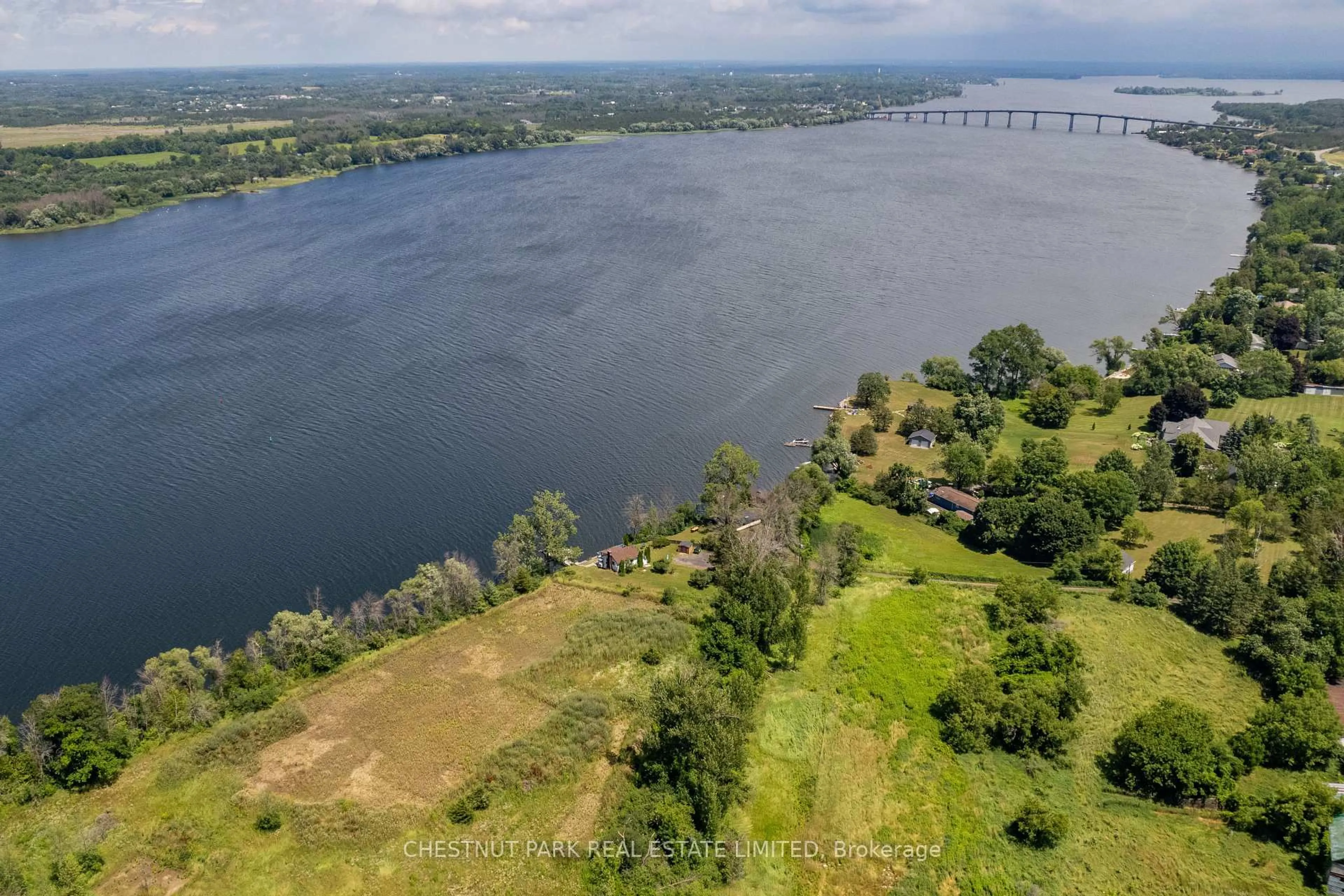 A pic from outside/outdoor area/front of a property/back of a property/a pic from drone, water/lake/river/ocean view for 35 Narrows Lane, Prince Edward County Ontario K0K 2T0