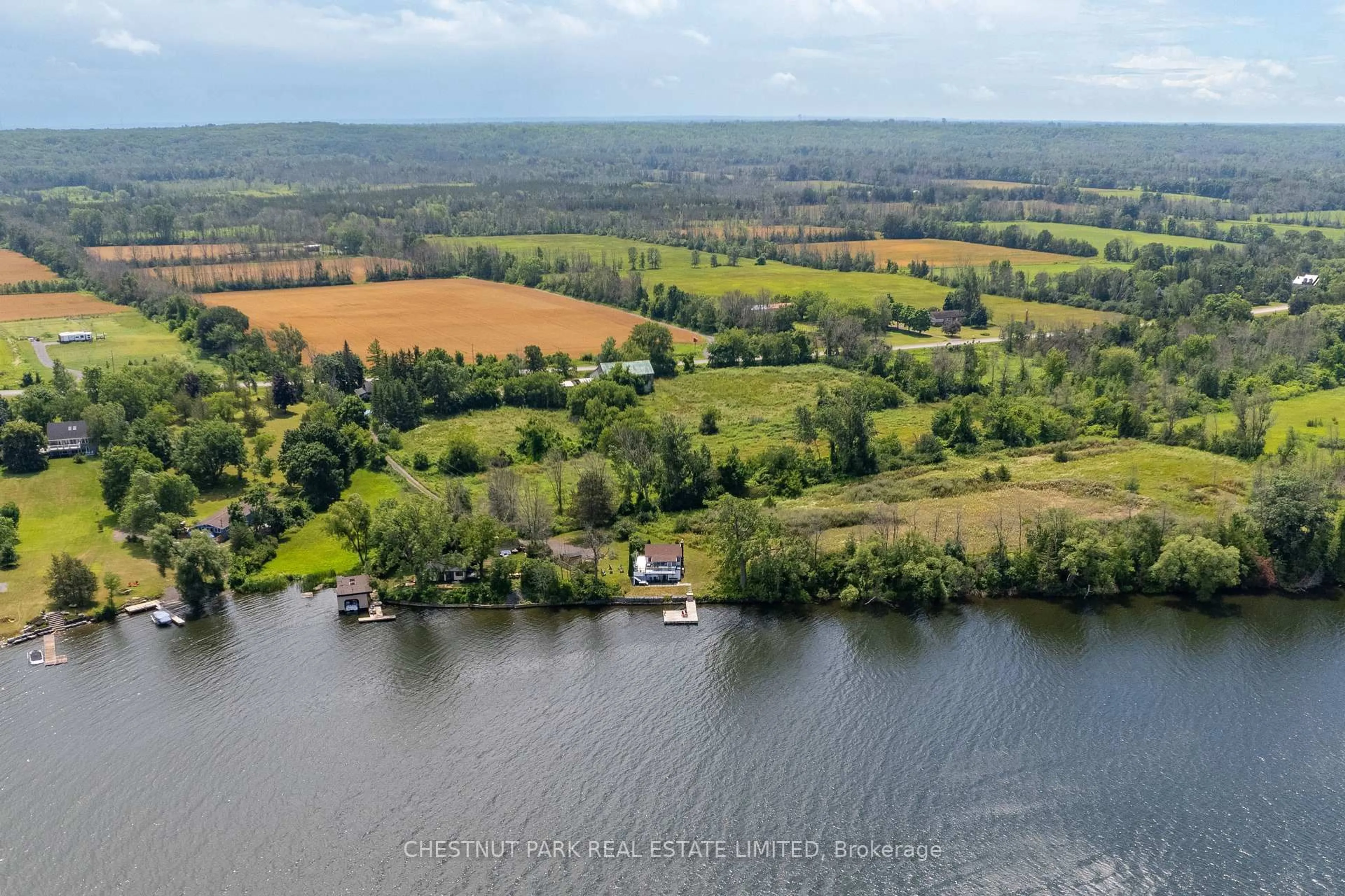 A pic from outside/outdoor area/front of a property/back of a property/a pic from drone, water/lake/river/ocean view for 35 Narrows Lane, Prince Edward County Ontario K0K 2T0
