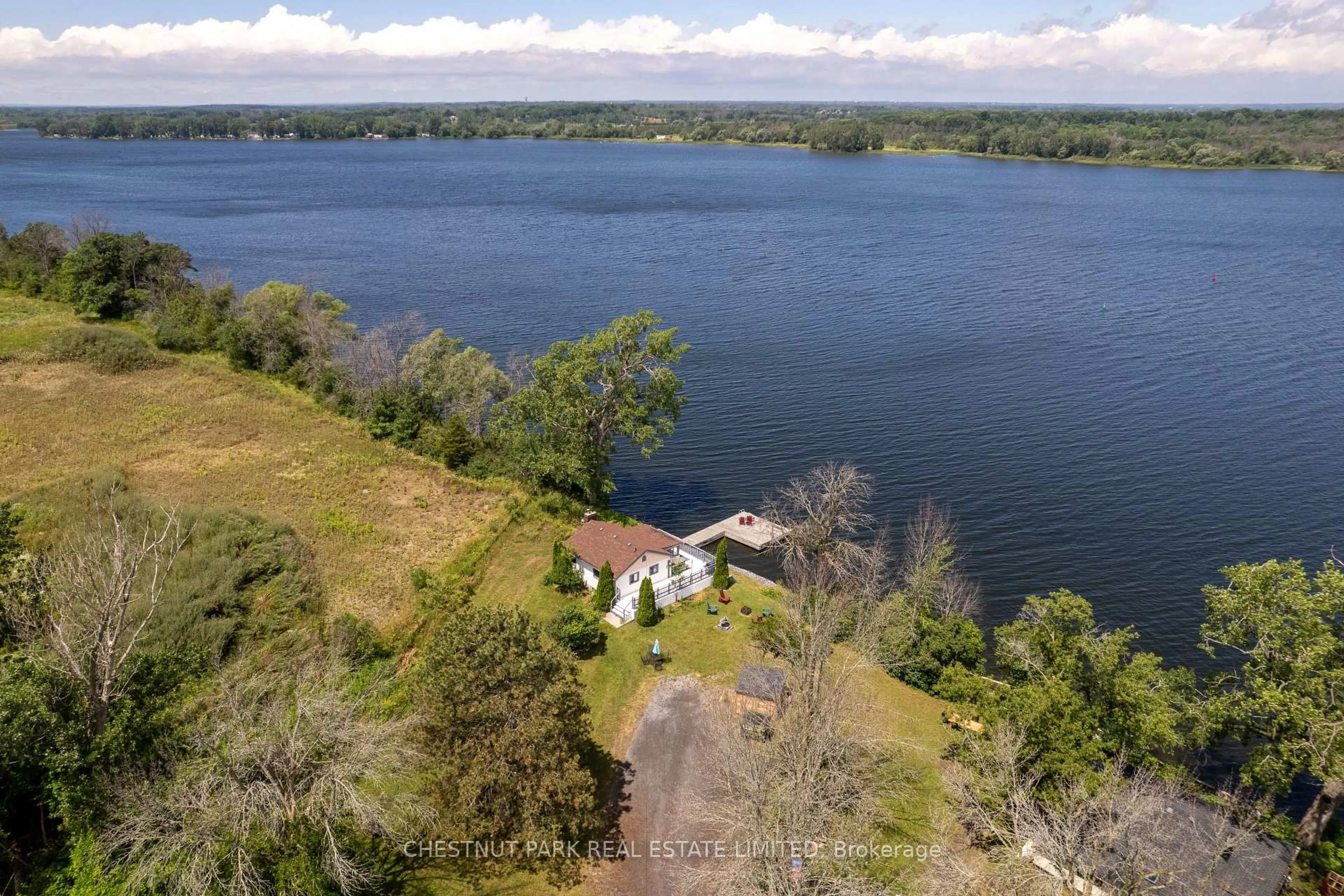 A pic from outside/outdoor area/front of a property/back of a property/a pic from drone, water/lake/river/ocean view for 35 Narrows Lane, Prince Edward County Ontario K0K 2T0