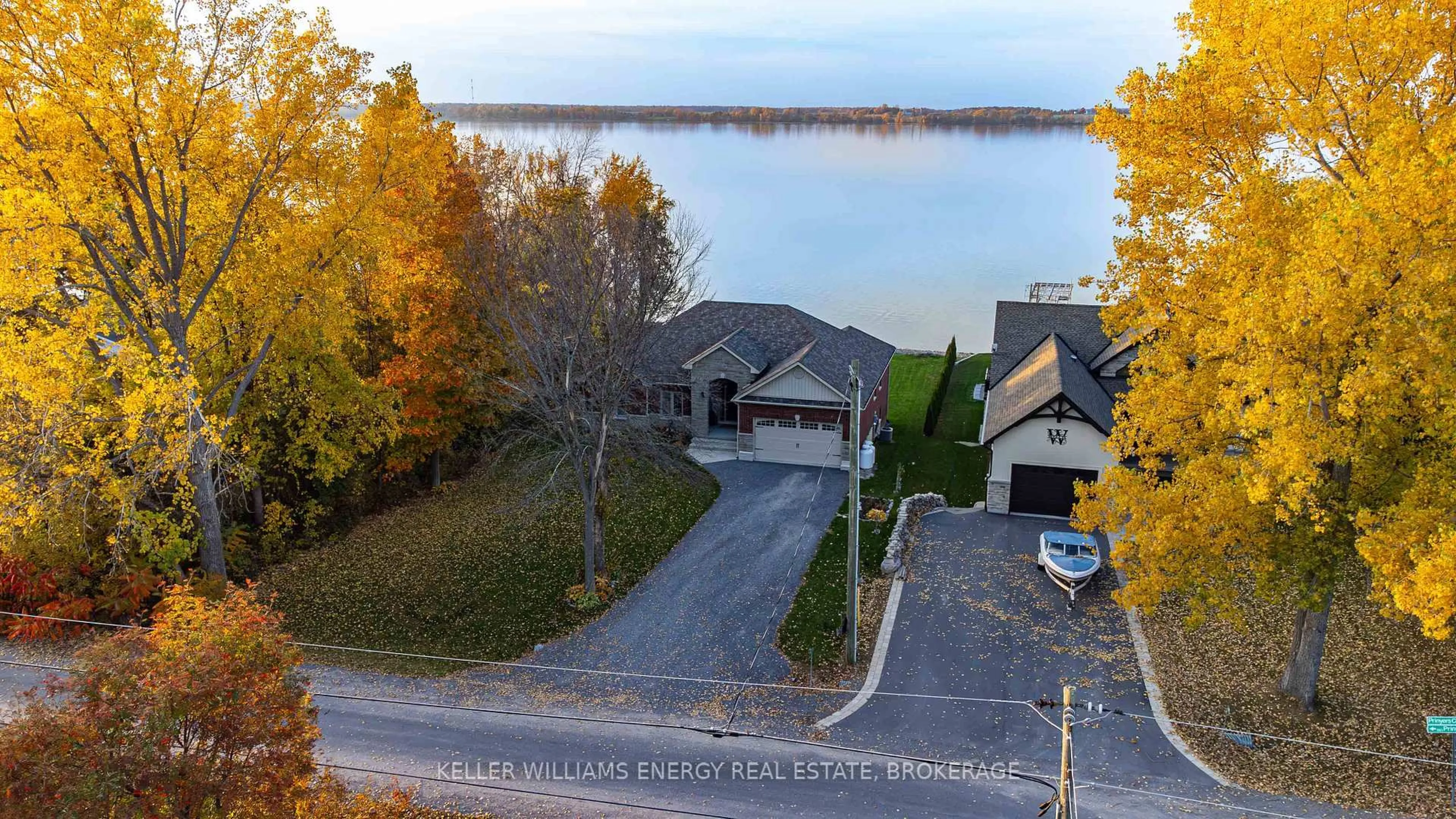 A pic from outside/outdoor area/front of a property/back of a property/a pic from drone, water/lake/river/ocean view for 4 Prinyers Dr, Prince Edward County Ontario K0K 2T0