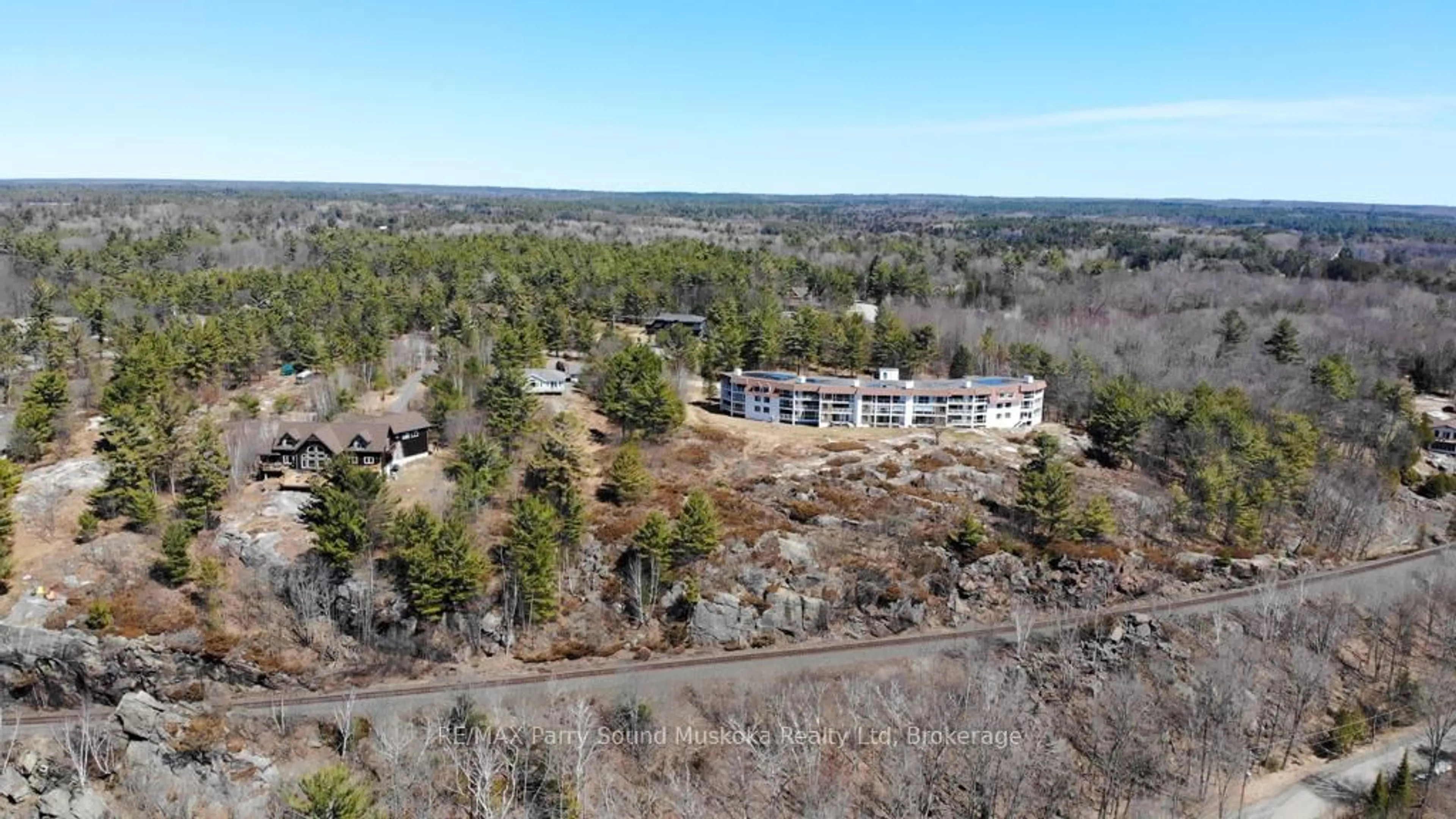 A pic from outside/outdoor area/front of a property/back of a property/a pic from drone, unknown for 20 RYDER Dr #2C, McDougall Ontario P2A 2W9