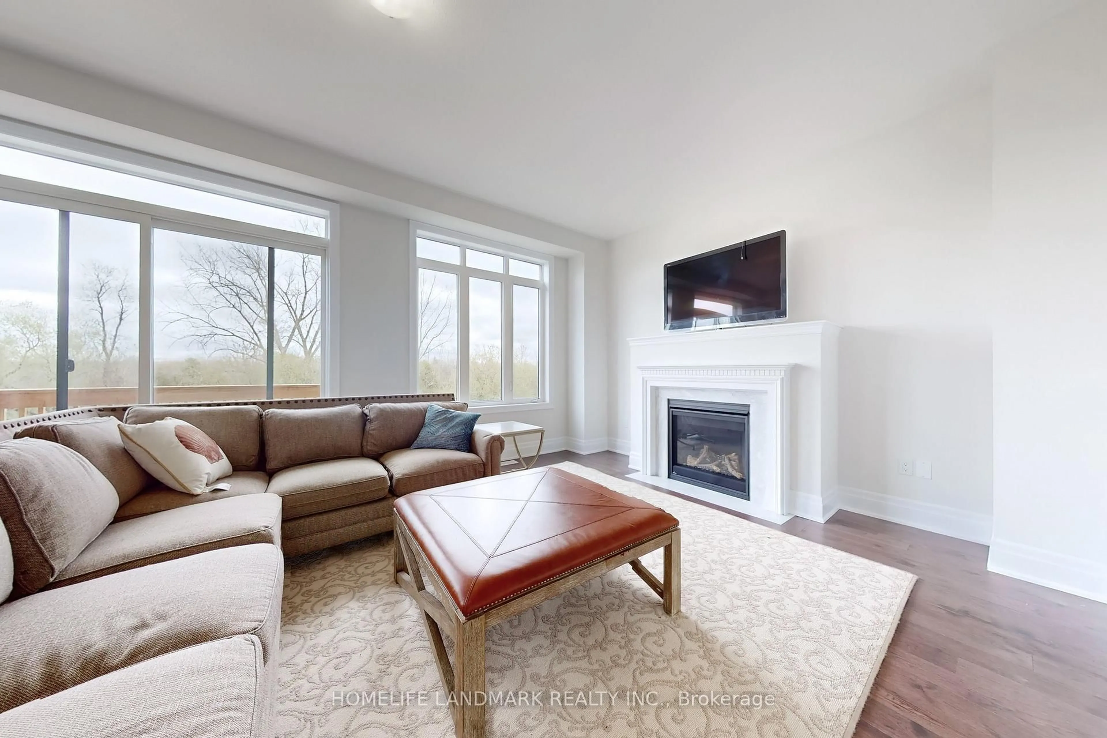 Living room with furniture, wood/laminate floor for 30 Mears Rd, Brant Ontario N3L 0M6