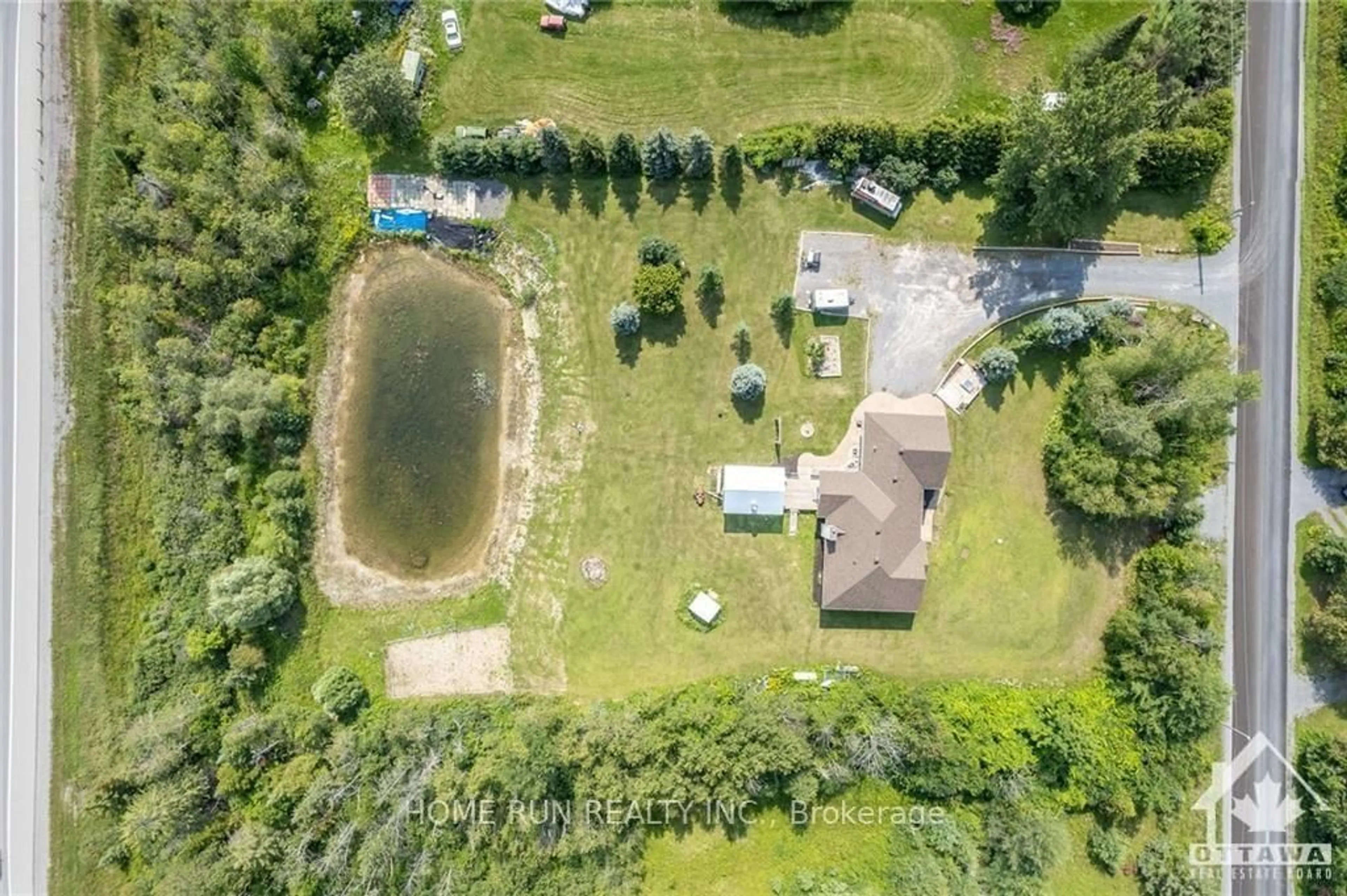 A pic from outside/outdoor area/front of a property/back of a property/a pic from drone, water/lake/river/ocean view for 840 David Manchester Rd, Carp Ontario K0A 1L0