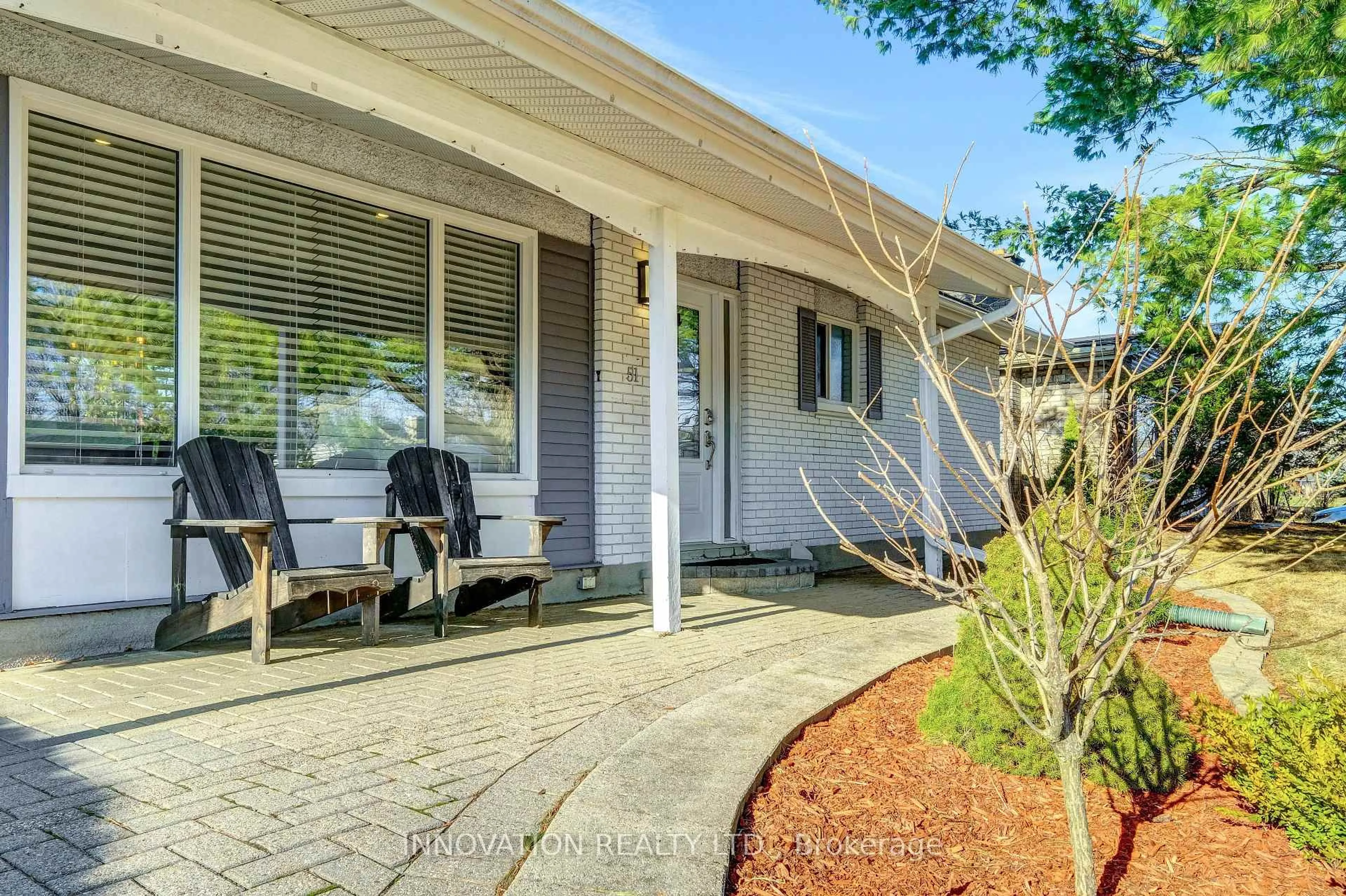 Home with vinyl exterior material, street for 51 Cleadon Dr, Ottawa Ontario K2H 5P4