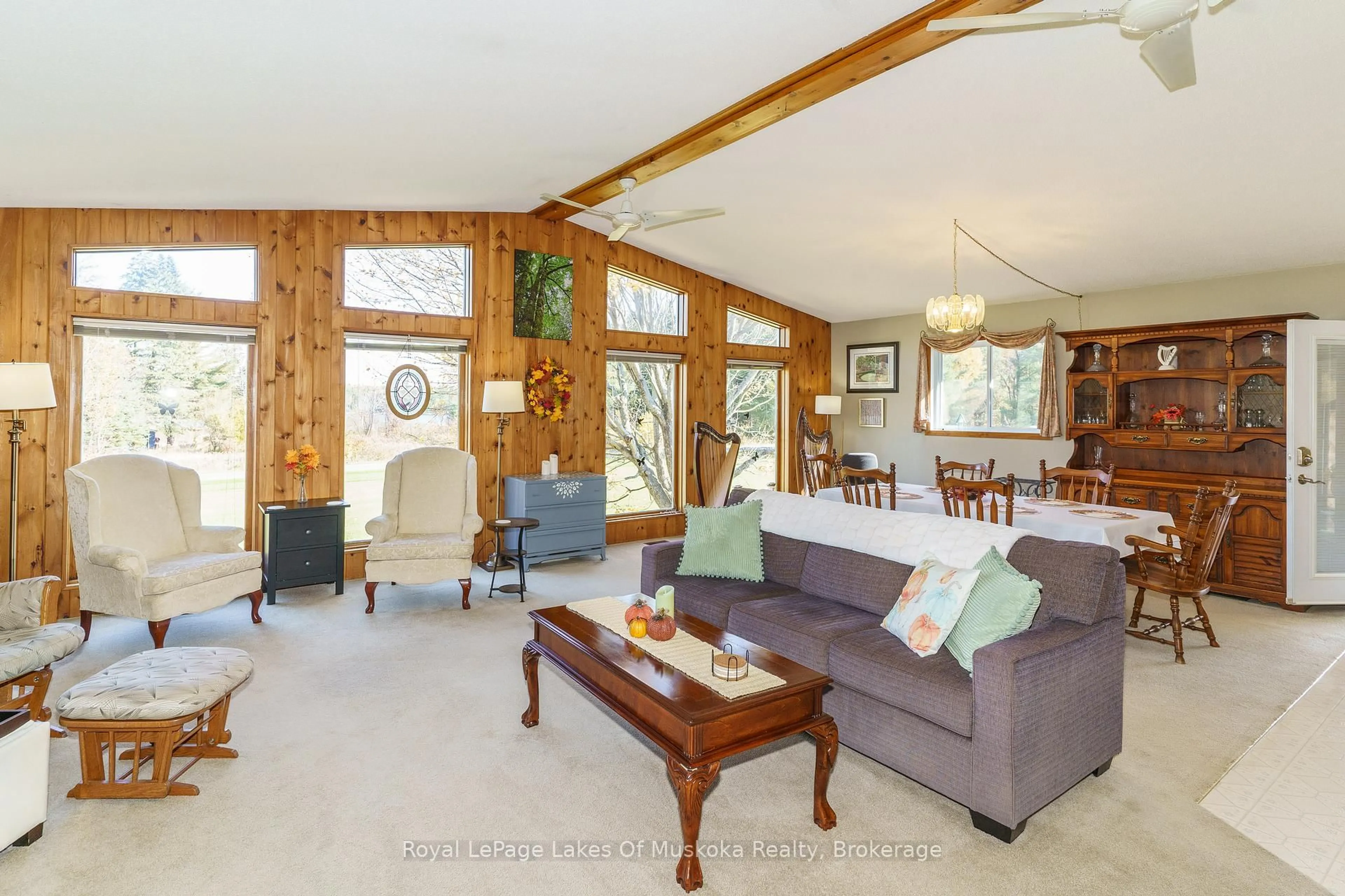 Living room with furniture, wood/laminate floor for 1394 REAY Rd, Gravenhurst Ontario P1P 1R3