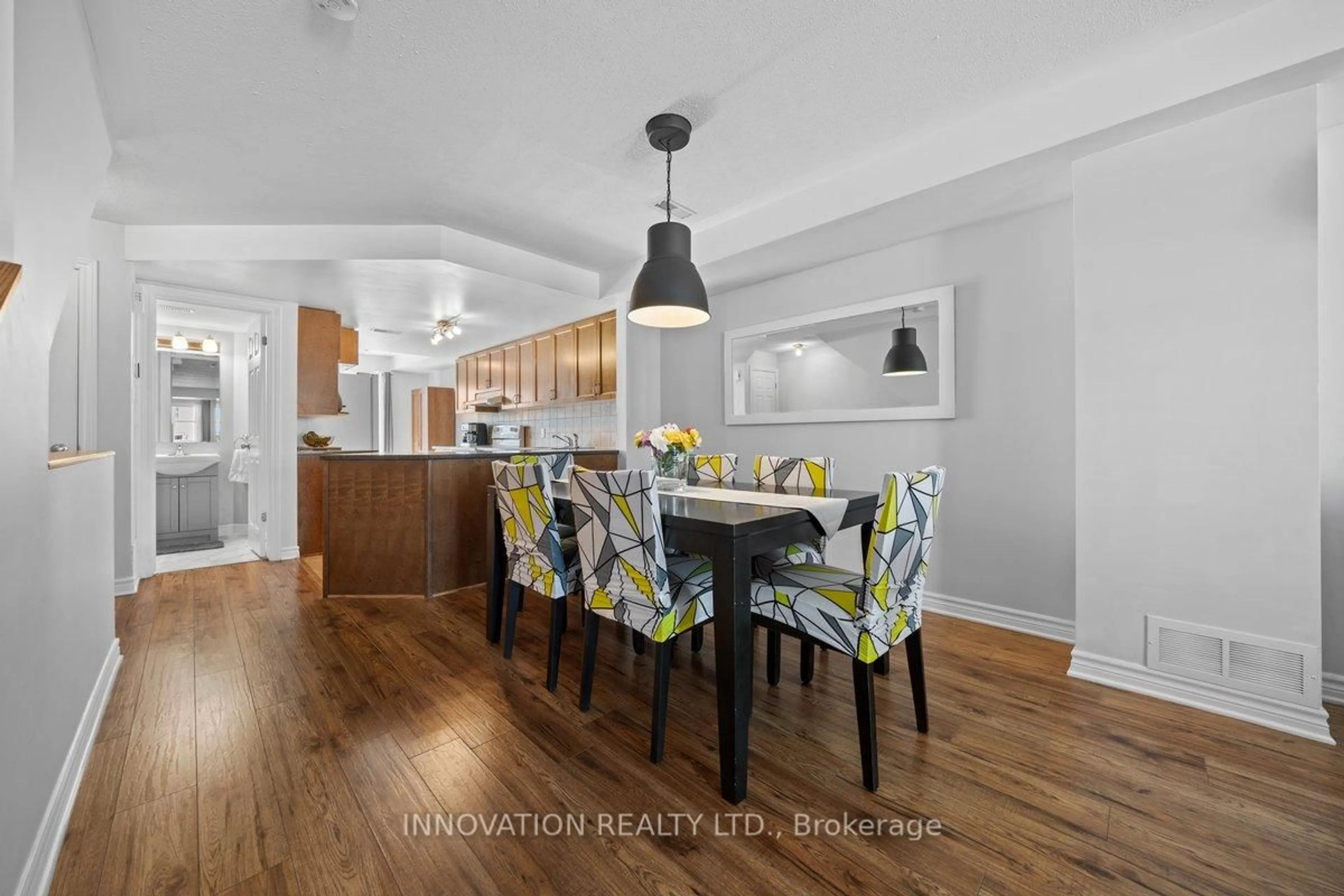 Open concept kitchen, wood/laminate floor for 742b Chapman Mills Dr, Ottawa Ontario K2J 3V2