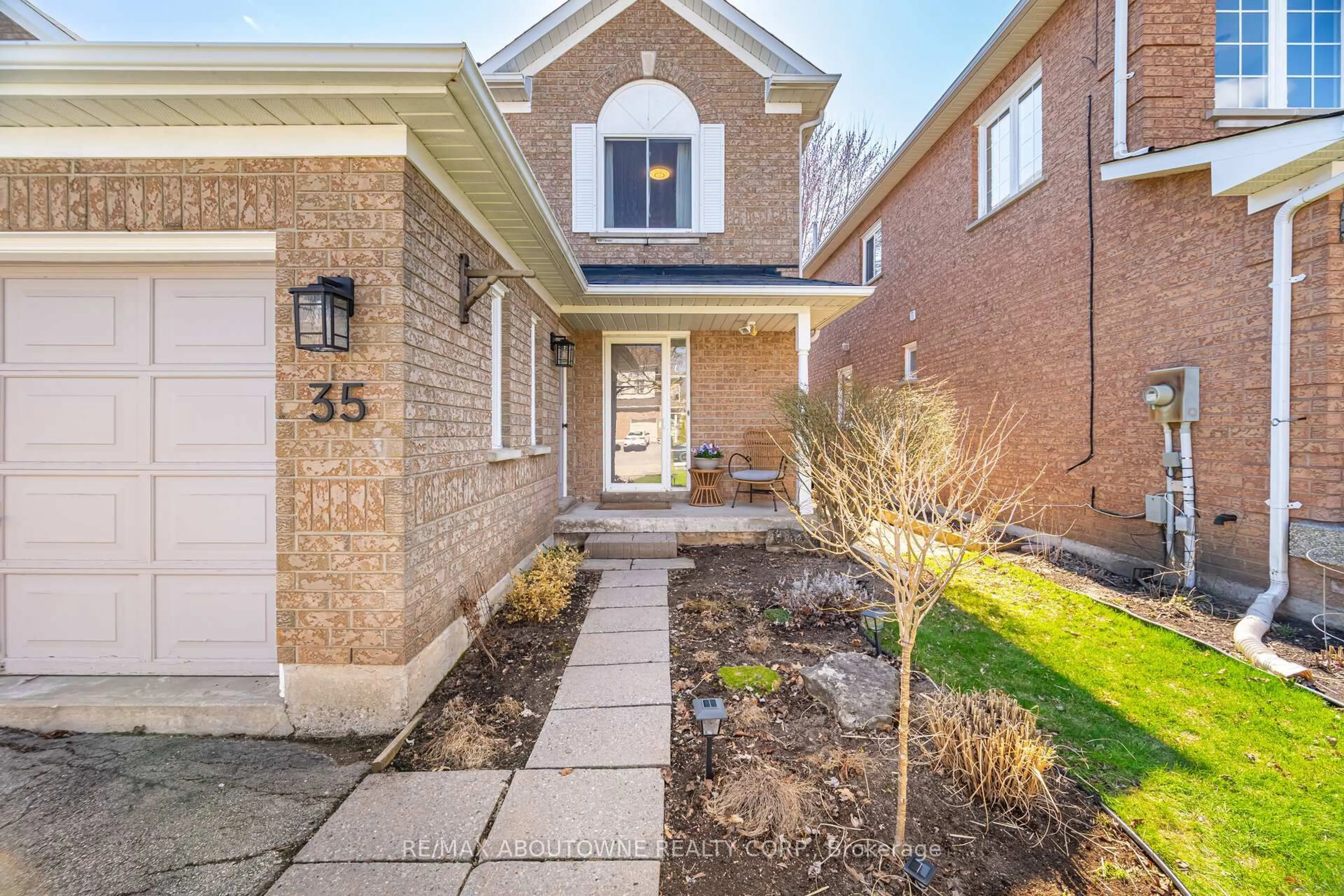 Home with brick exterior material, street for 35 Harnesworth Cres, Hamilton Ontario L0R 2H6