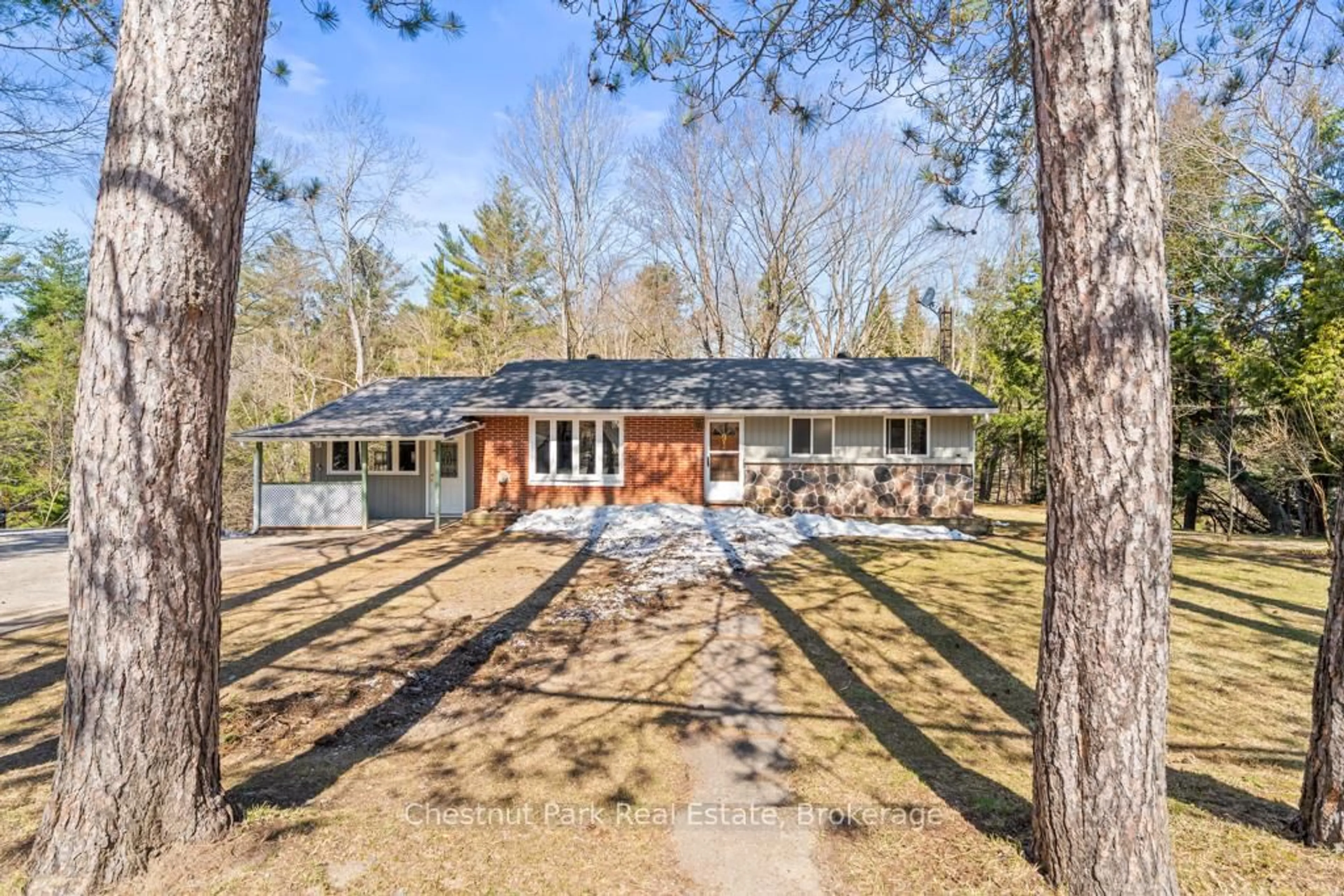 A pic from outside/outdoor area/front of a property/back of a property/a pic from drone, unknown for 91 Santas Village Rd, Bracebridge Ontario P1L 0N3