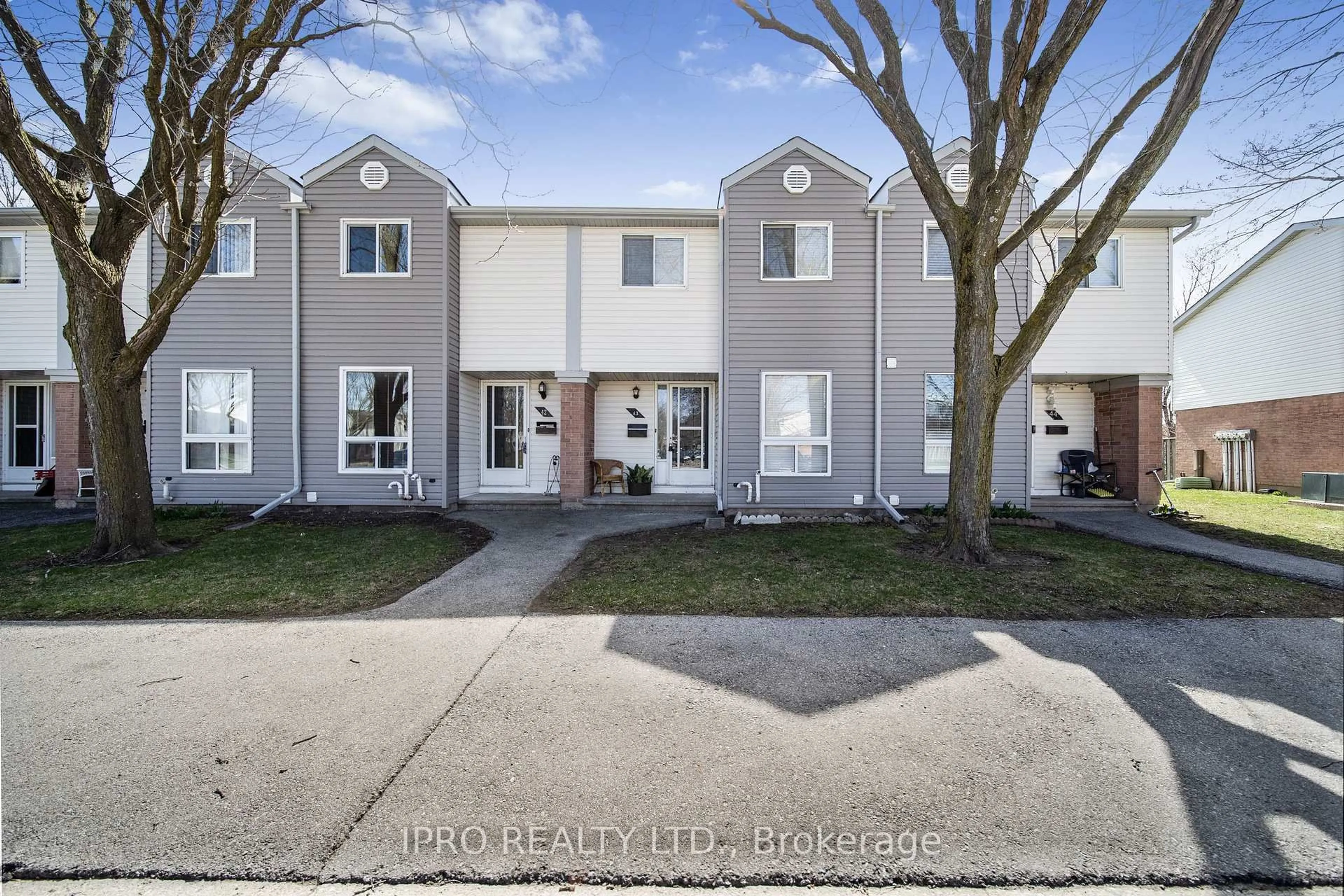 A pic from outside/outdoor area/front of a property/back of a property/a pic from drone, street for 40 Imperial Rd #43, Guelph Ontario N1H 8B4