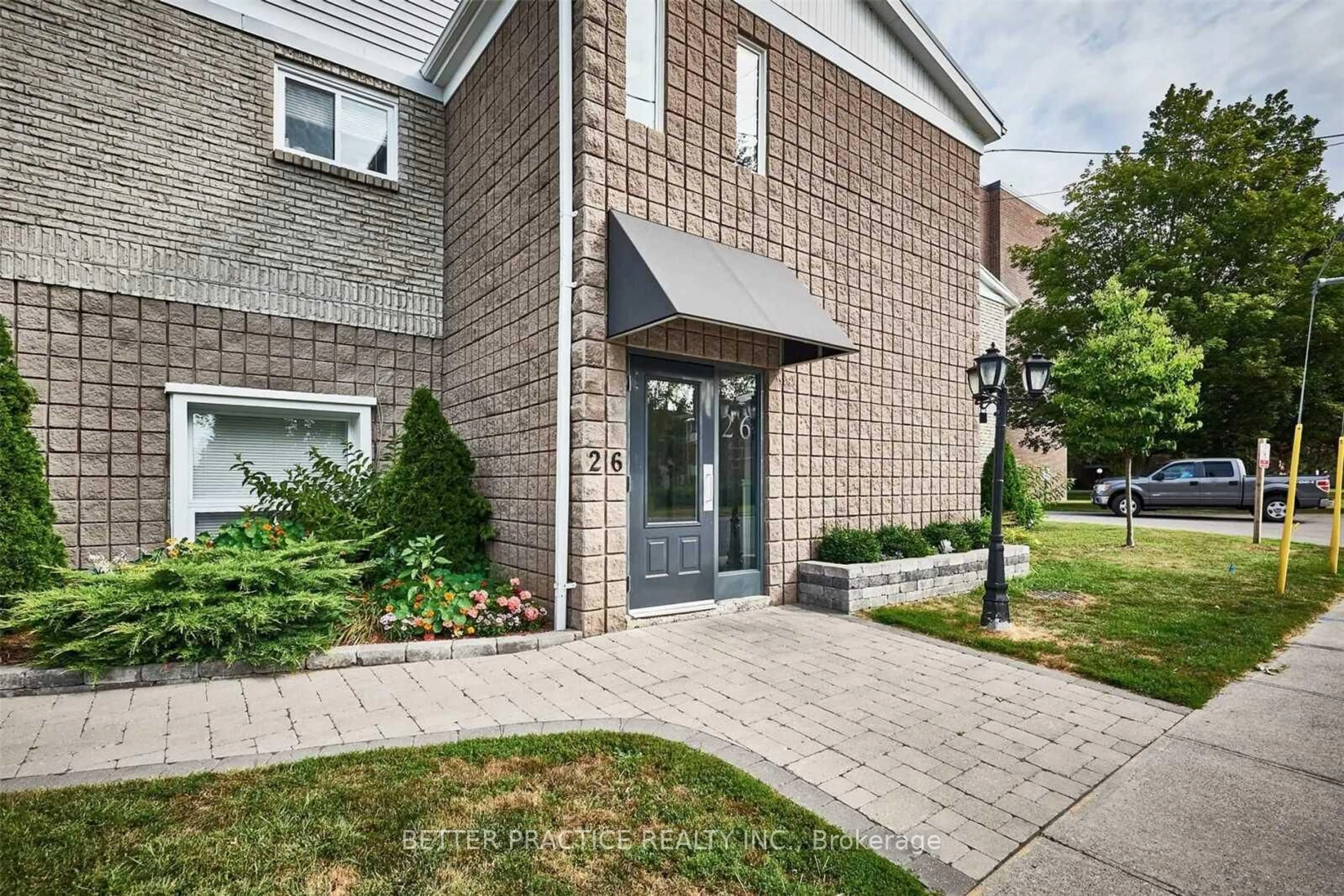 Home with brick exterior material, street for 26 Spencer St #210, Cobourg Ontario K9A 1C2