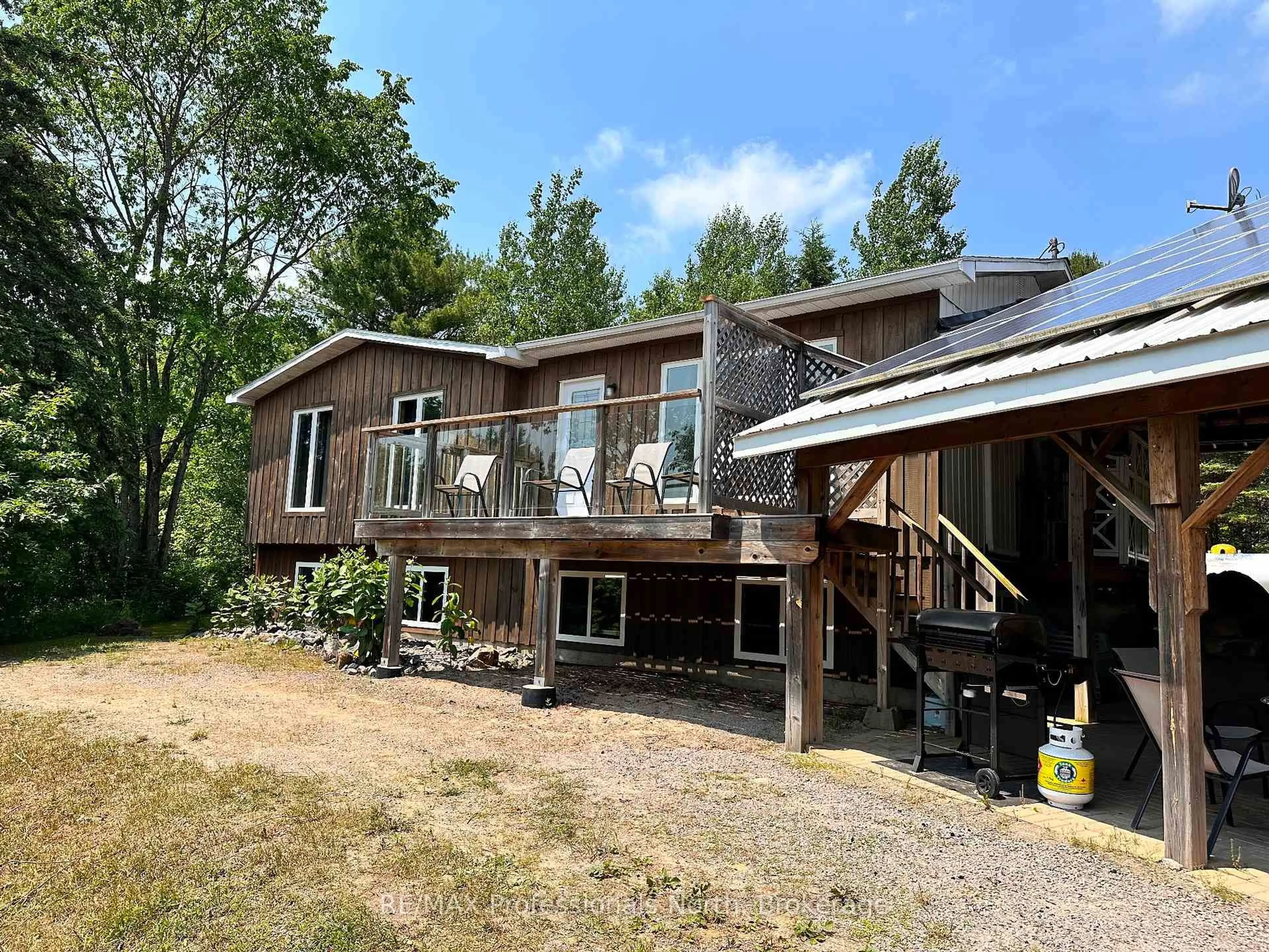 A pic from outside/outdoor area/front of a property/back of a property/a pic from drone, unknown for 10916 Highway 503 Highway, Highlands East Ontario K0M 1R0