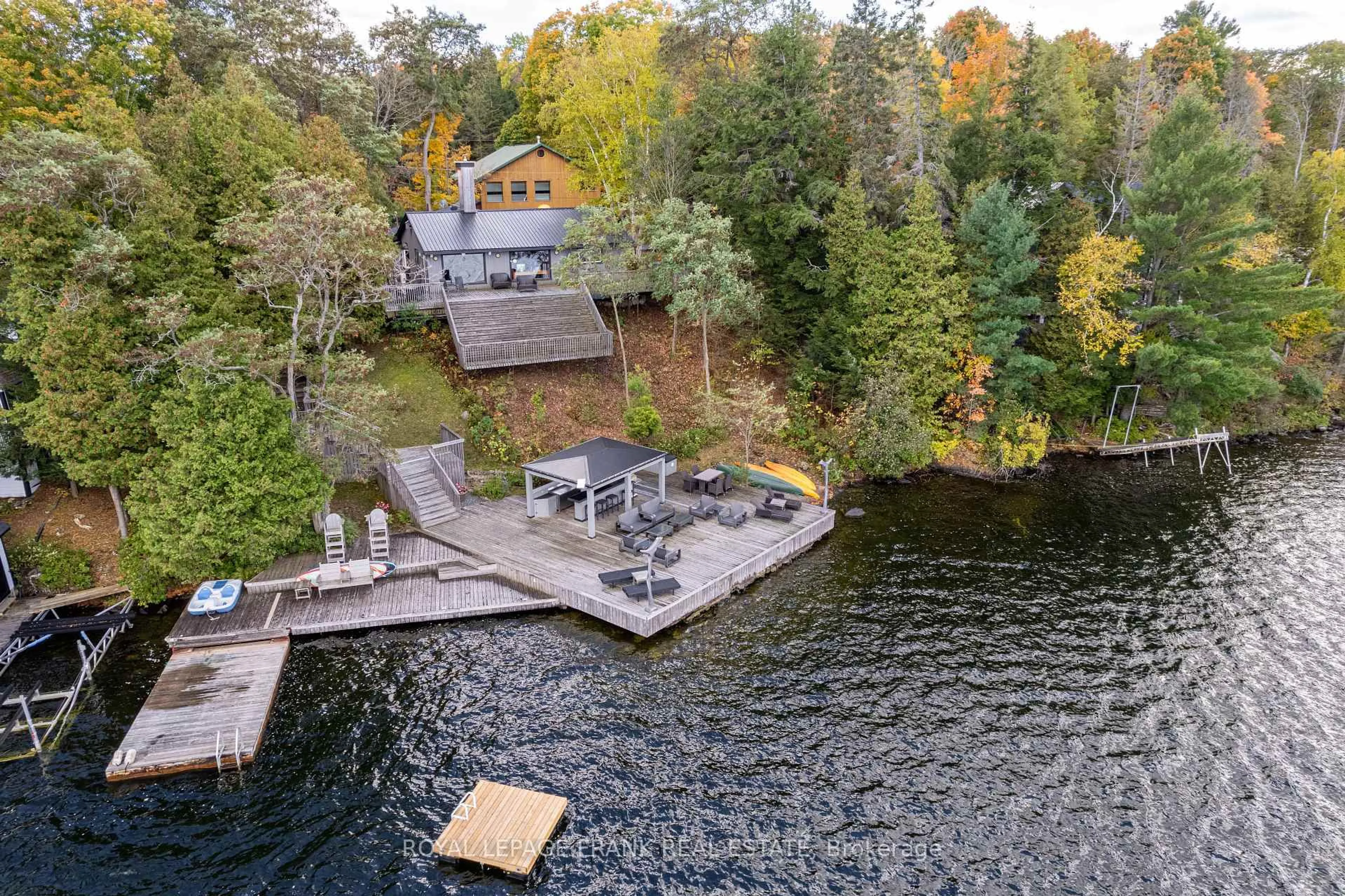 A pic from outside/outdoor area/front of a property/back of a property/a pic from drone, water/lake/river/ocean view for 1329 Trappers Lane, Douro-Dummer Ontario K0L 2H0