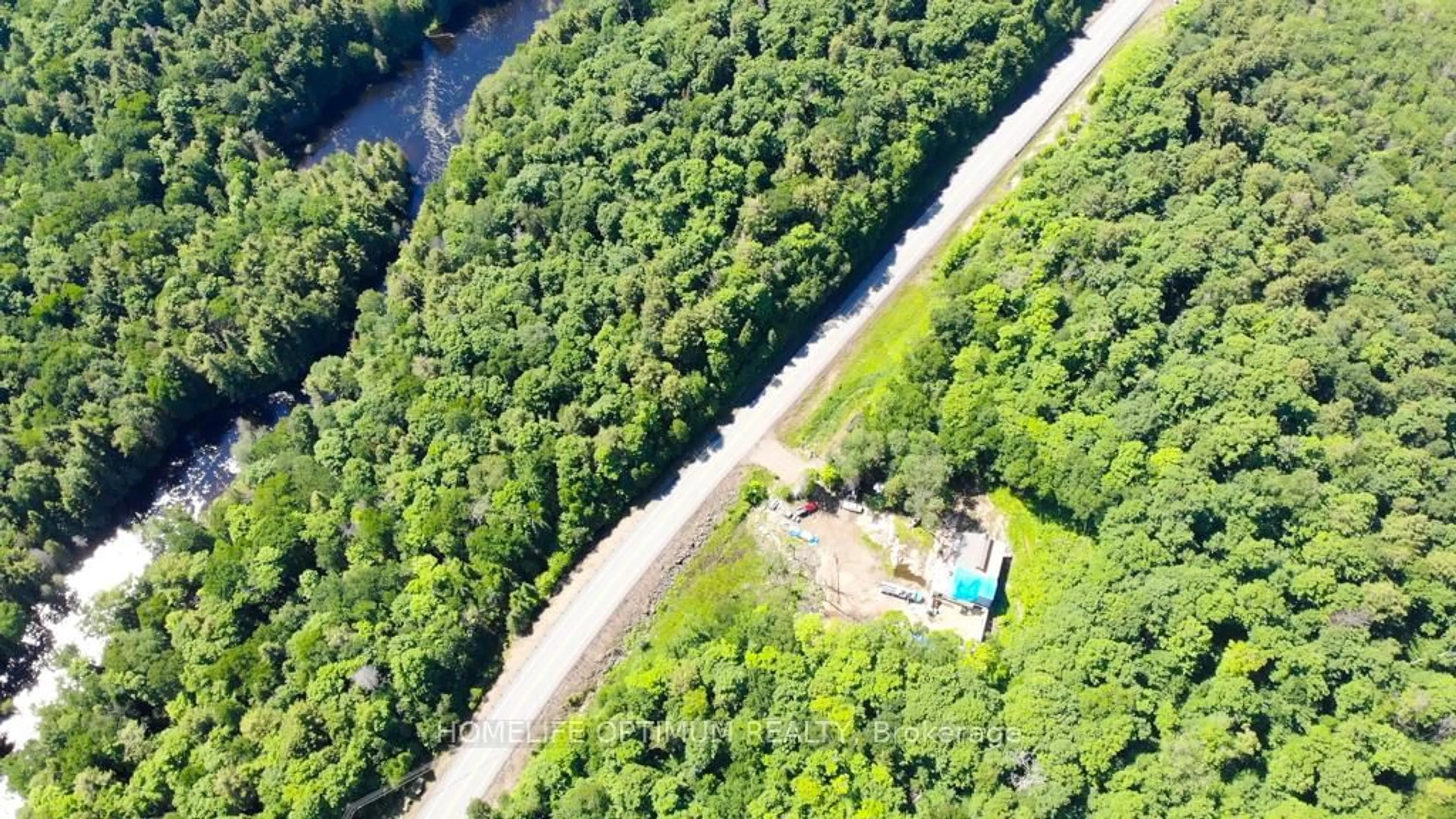 A pic from outside/outdoor area/front of a property/back of a property/a pic from drone, water/lake/river/ocean view for 3655 HWY 60 N/A, Algonquin Highlands Ontario P0A 1H0