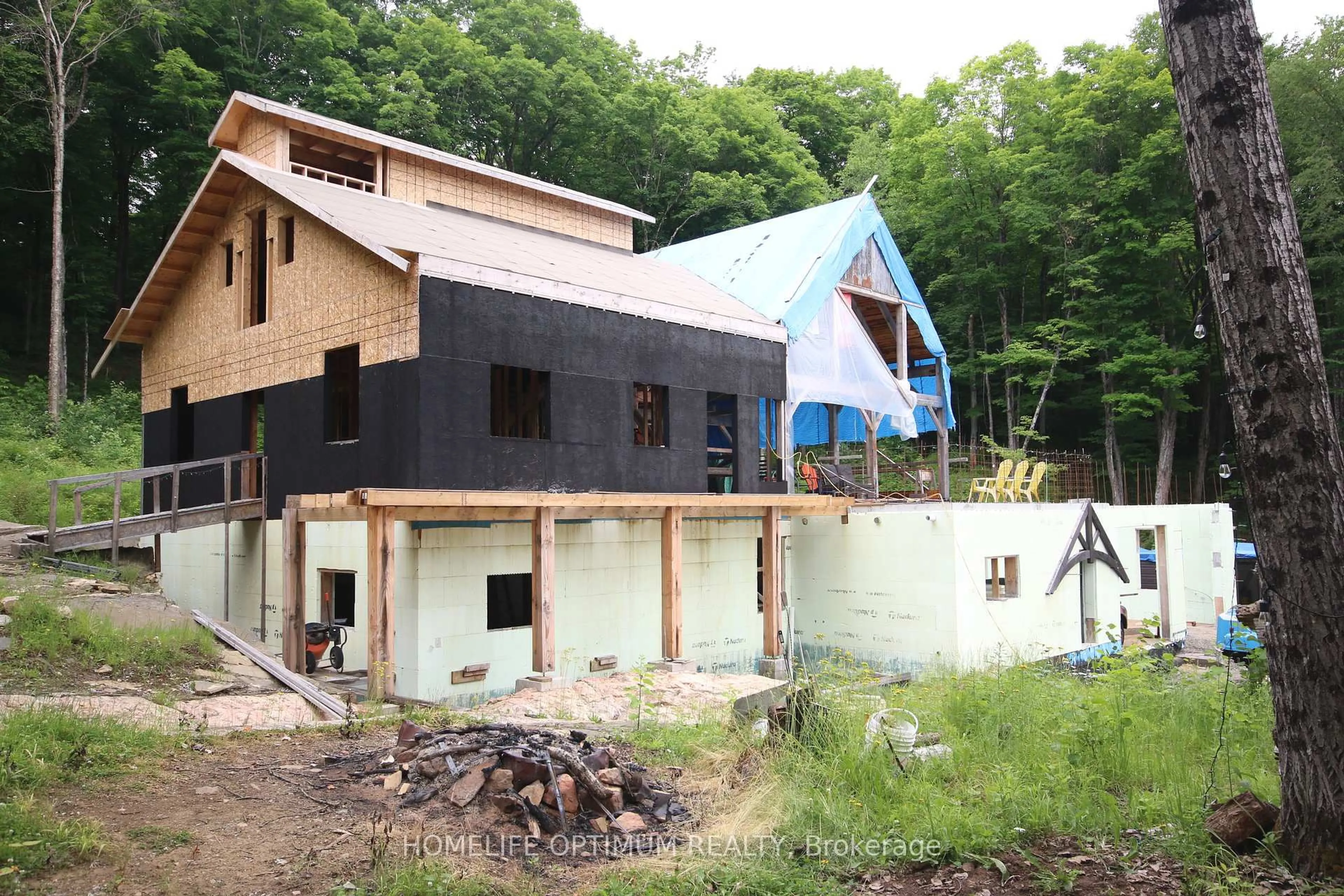 Home with vinyl exterior material, building for 3655 HWY 60 N/A, Algonquin Highlands Ontario P0A 1H0