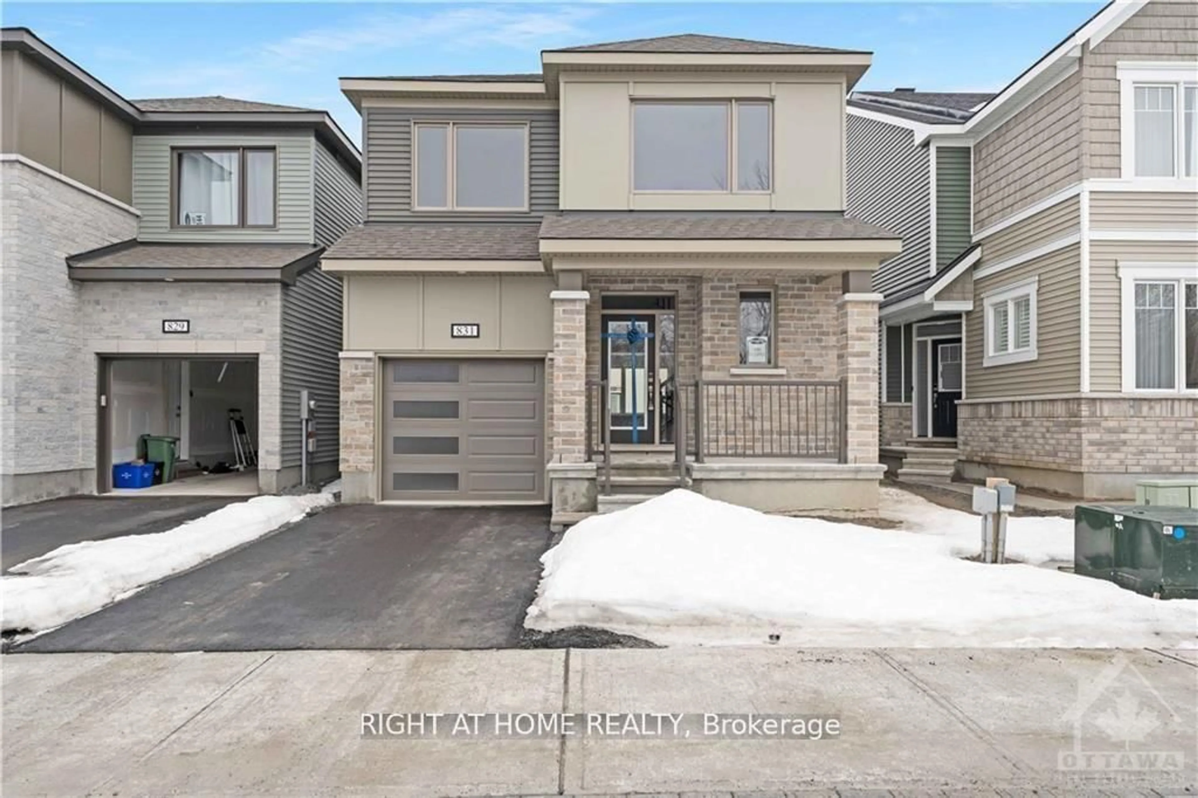 Home with brick exterior material, street for 831 Derreen Ave, Stittsville Ontario K2S 3A7