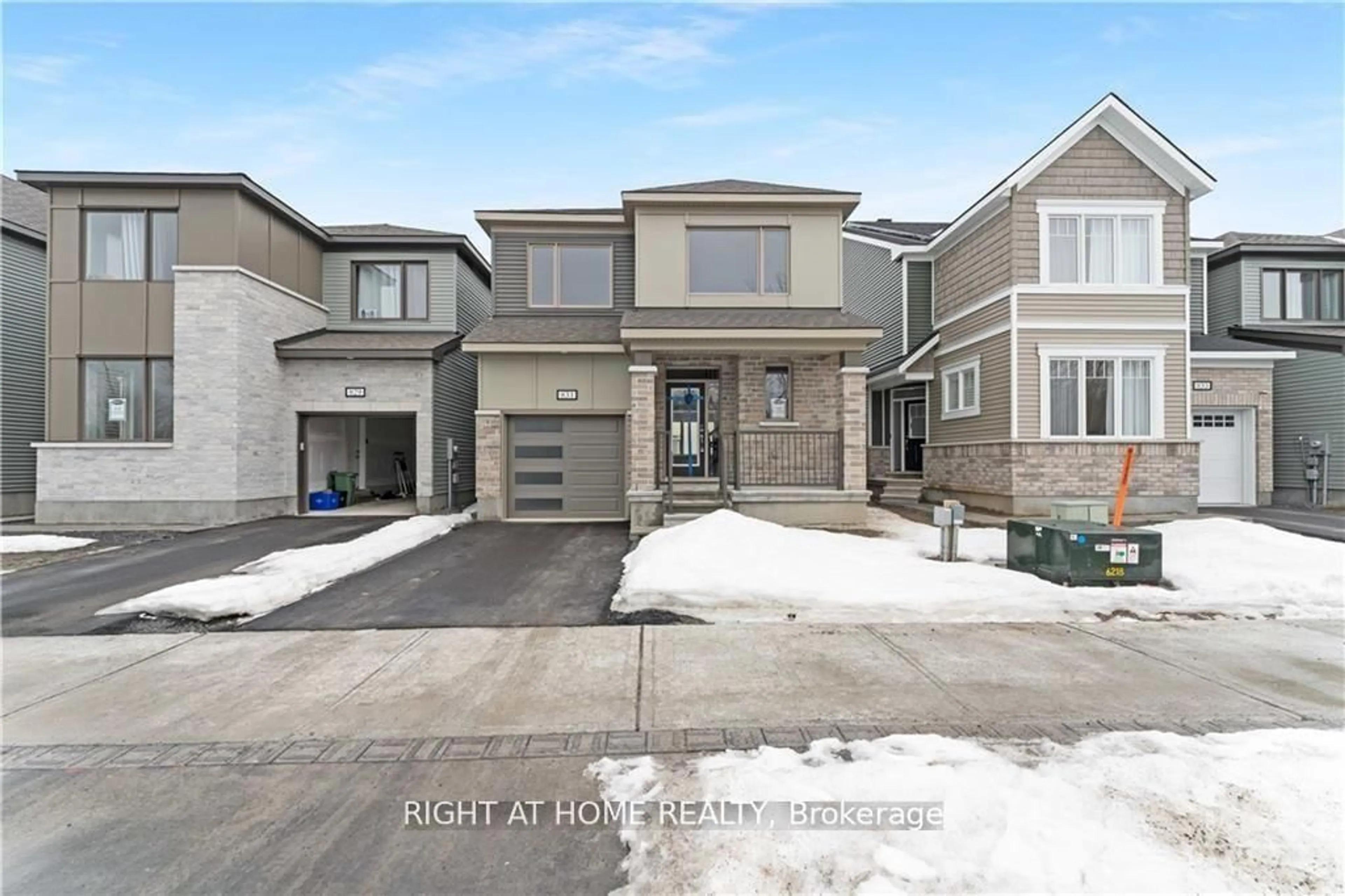 Home with brick exterior material, street for 831 Derreen Ave, Stittsville Ontario K2S 3A7