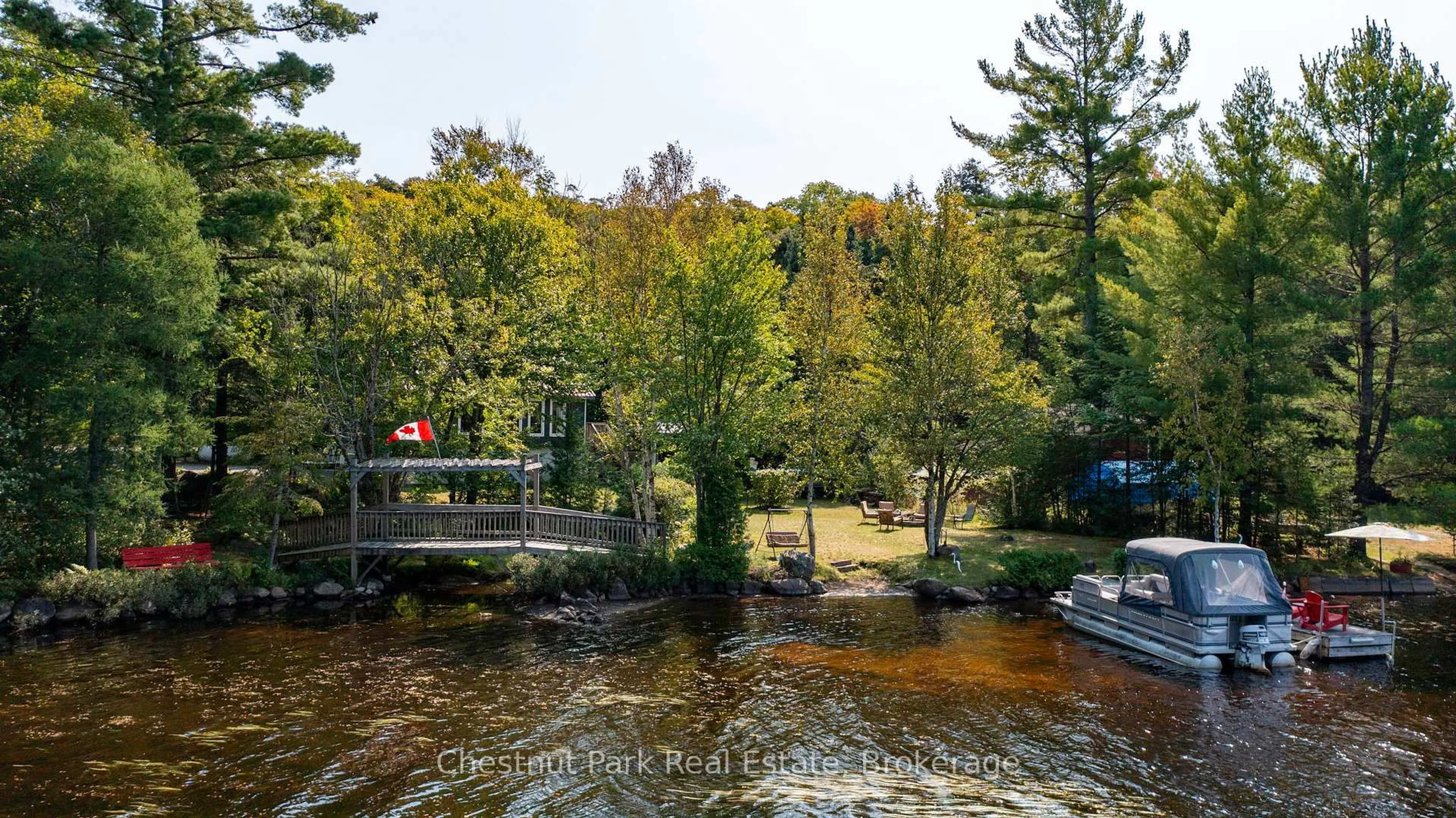 A pic from outside/outdoor area/front of a property/back of a property/a pic from drone, water/lake/river/ocean view for 954 Dickie Lake Rd, Lake of Bays Ontario P0B 1A0