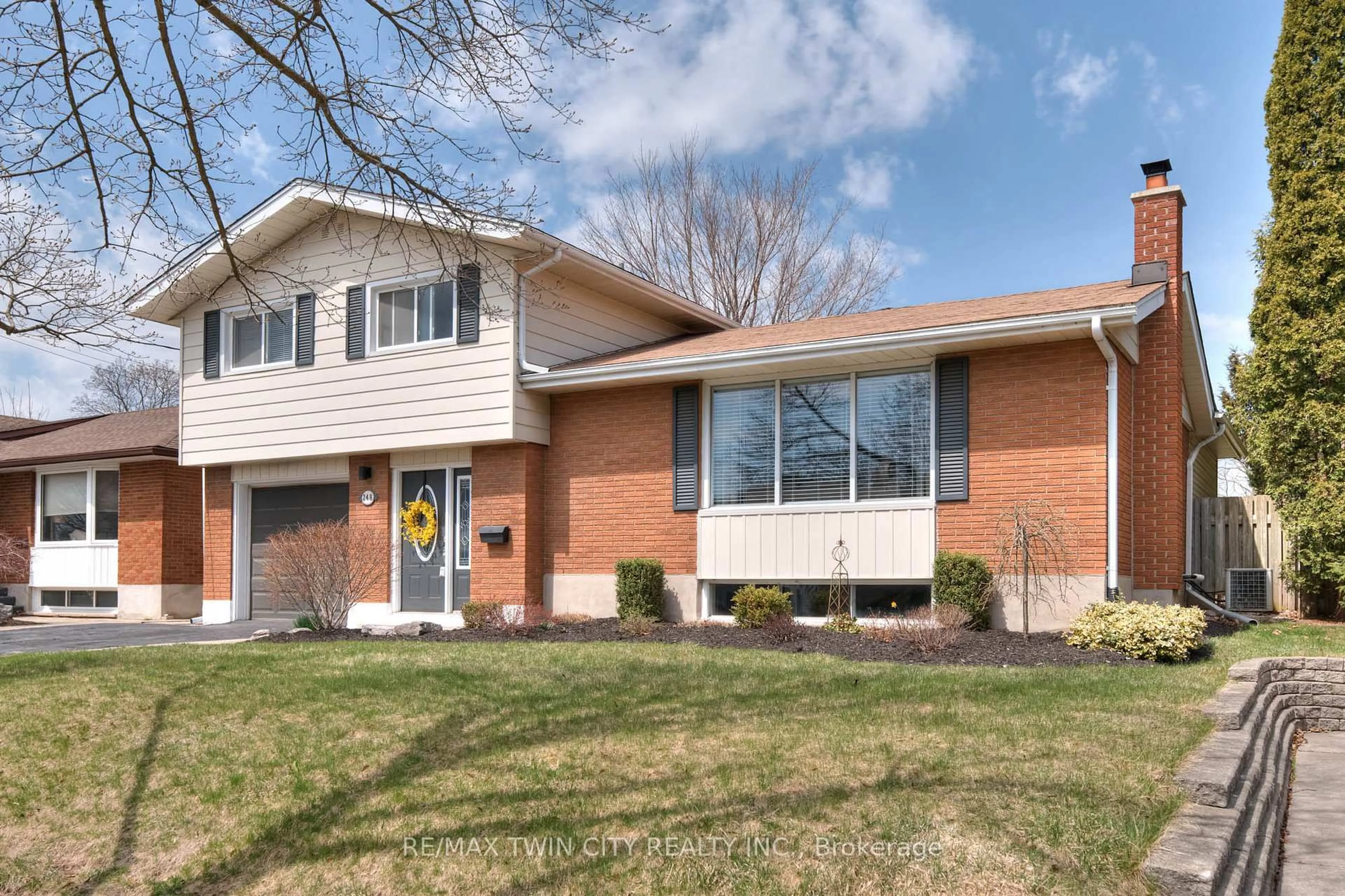 Home with brick exterior material, street for 248 Kenneth Ave, Kitchener Ontario N2A 1W4