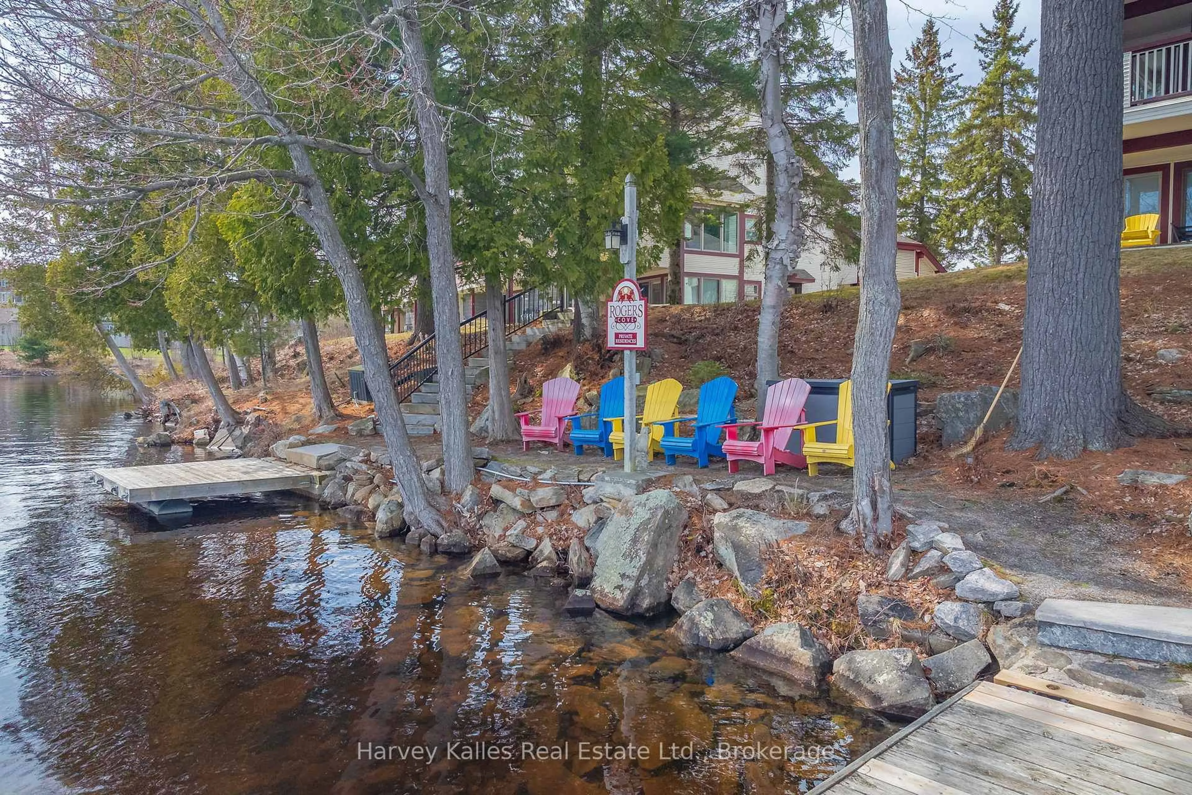 A pic from outside/outdoor area/front of a property/back of a property/a pic from drone, water/lake/river/ocean view for 10 Coveside Dr #204, Huntsville Ontario P1H 1C3