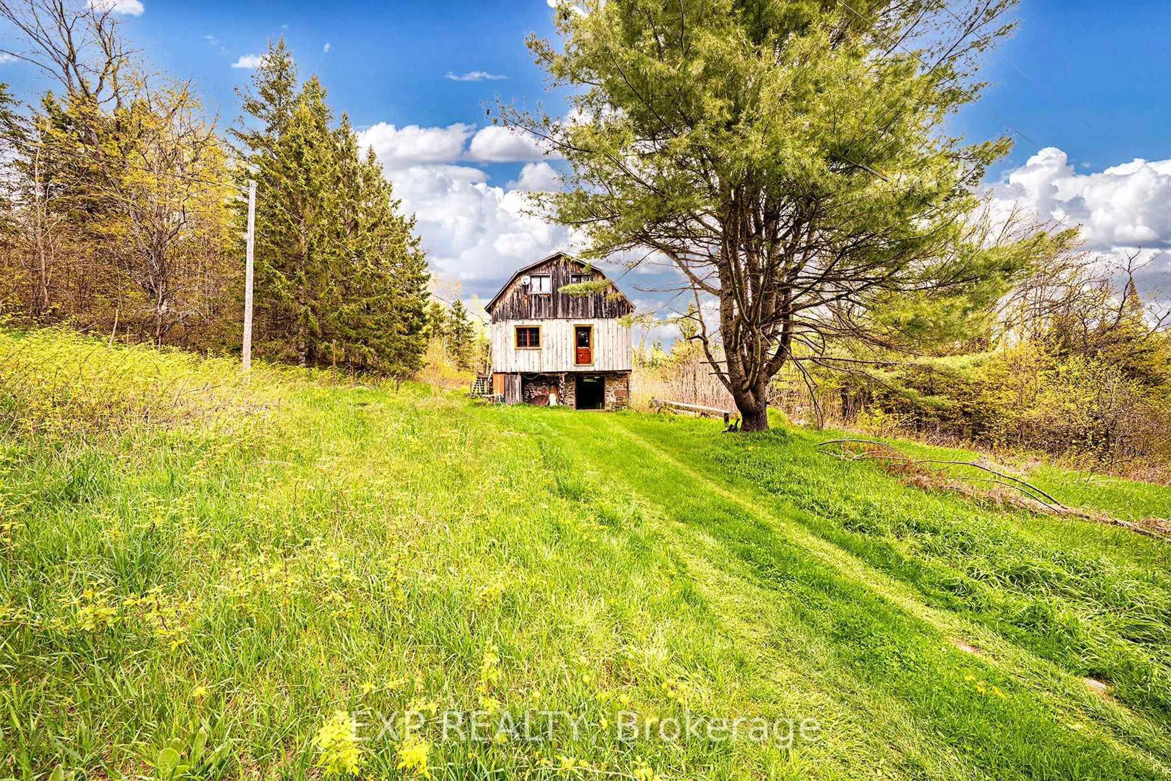 A pic from outside/outdoor area/front of a property/back of a property/a pic from drone, unknown for 1057 Macduff Rd, Highlands East Ontario K0L 2Y0