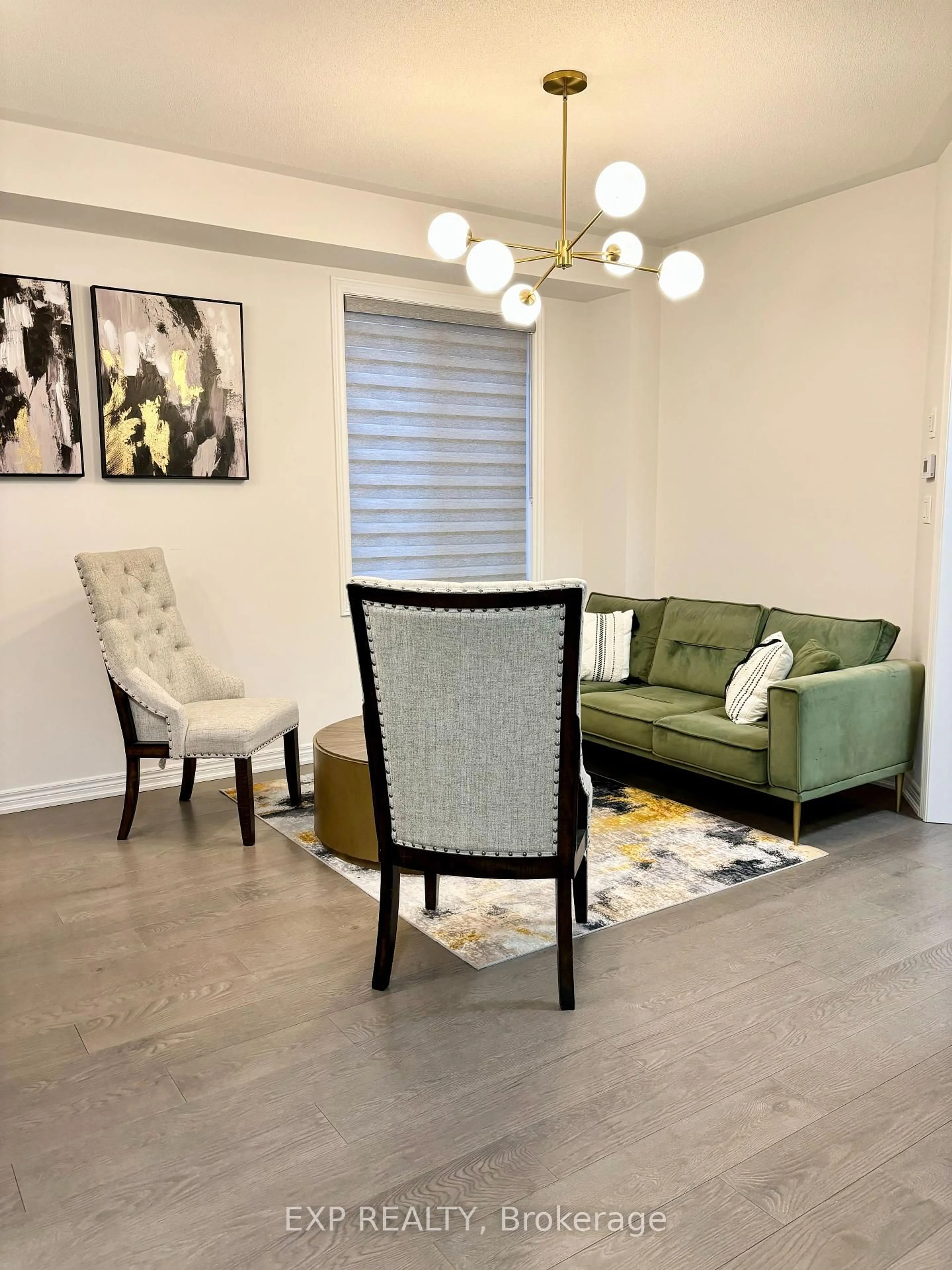 Living room with furniture, wood/laminate floor for 488 Black Cherry Cres, Shelburne Ontario L9V 3Y7