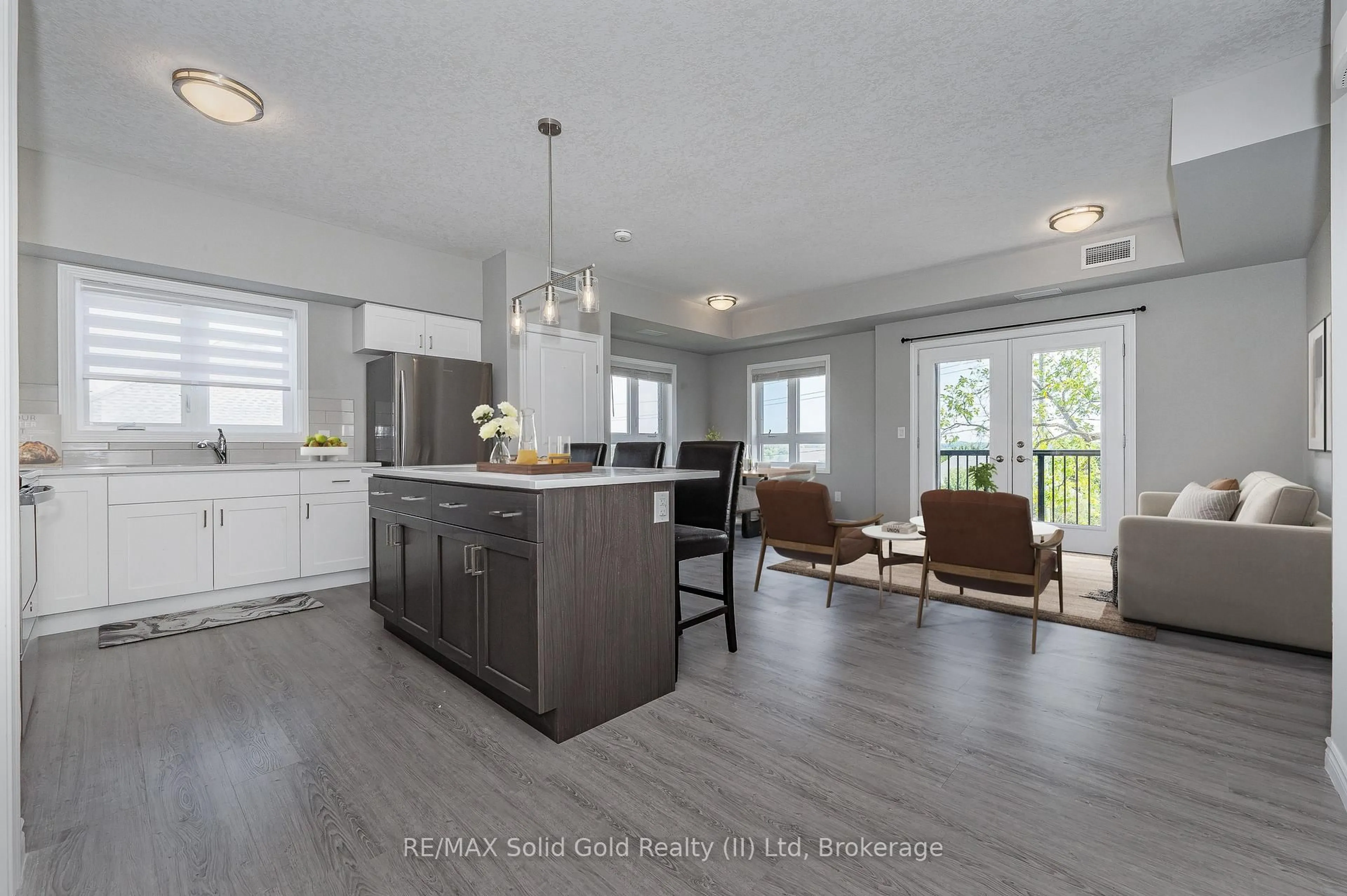 Open concept kitchen, wood/laminate floor for 408 GUELPH Ave #210, Cambridge Ontario N3C 0H3