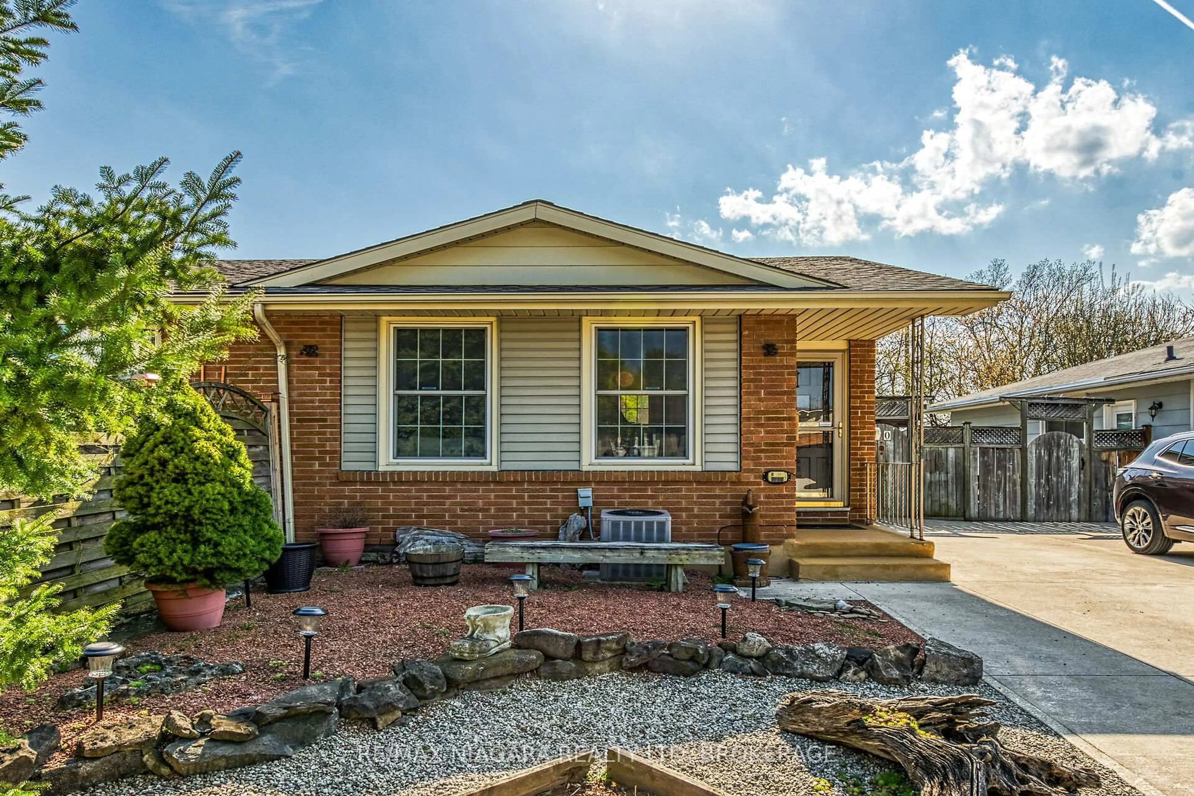 Home with brick exterior material, street for 70 Loraine Dr, St. Catharines Ontario L2P 3N8