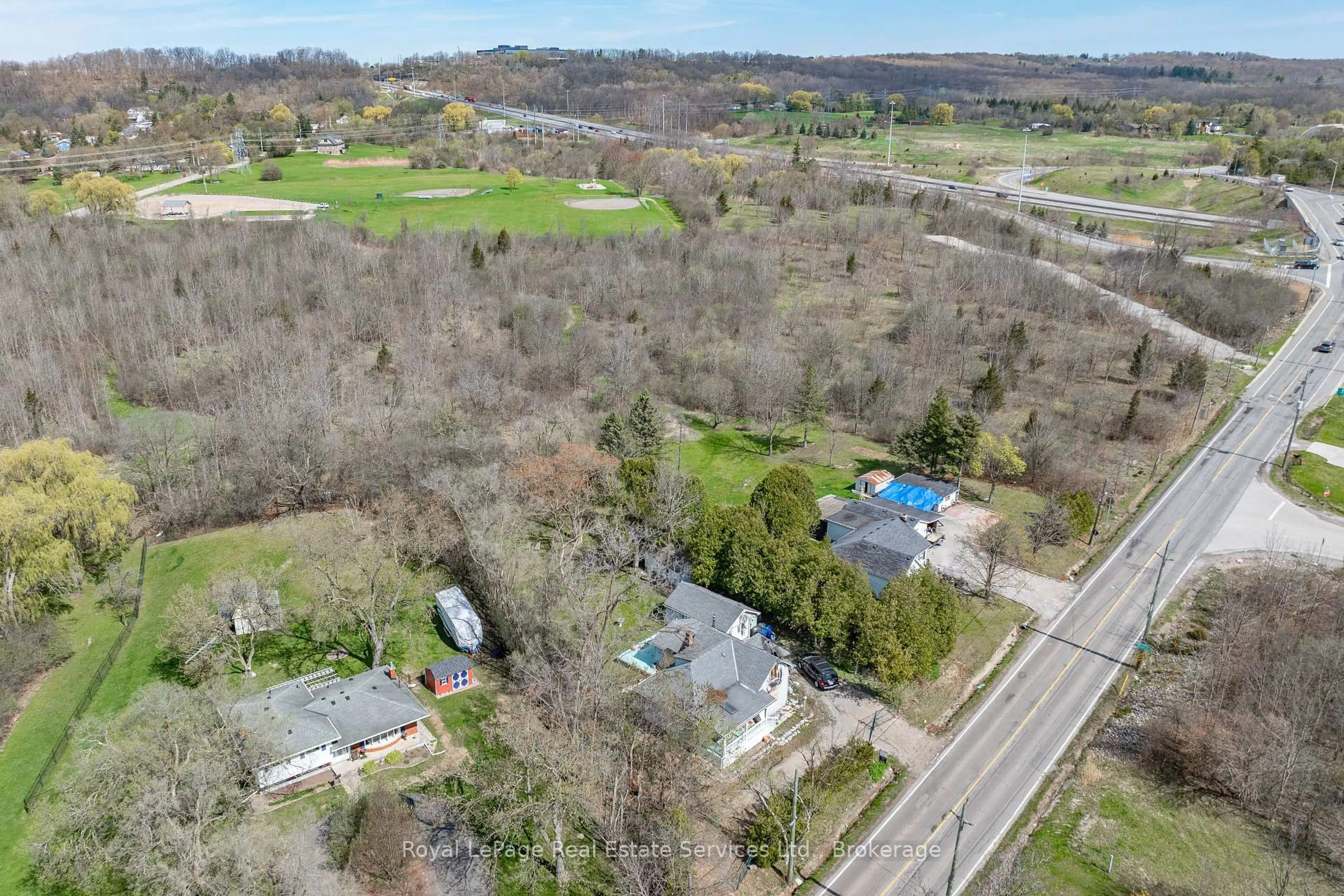A pic from outside/outdoor area/front of a property/back of a property/a pic from drone, water/lake/river/ocean view for 701 York Rd, Hamilton Ontario L9H 5W9