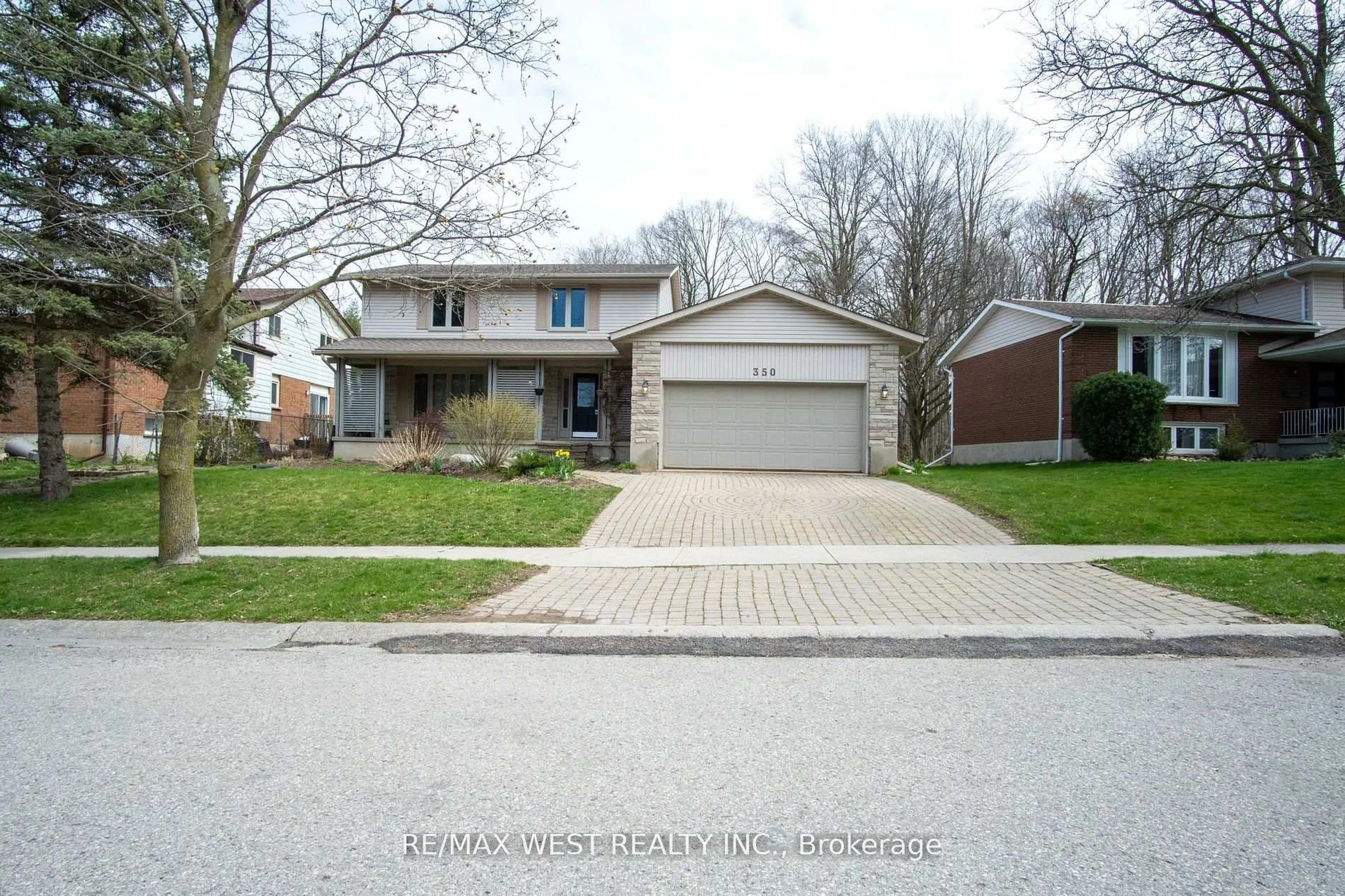 Home with brick exterior material, street for 350 Thorncrest Dr, Waterloo Ontario N2L 5R7