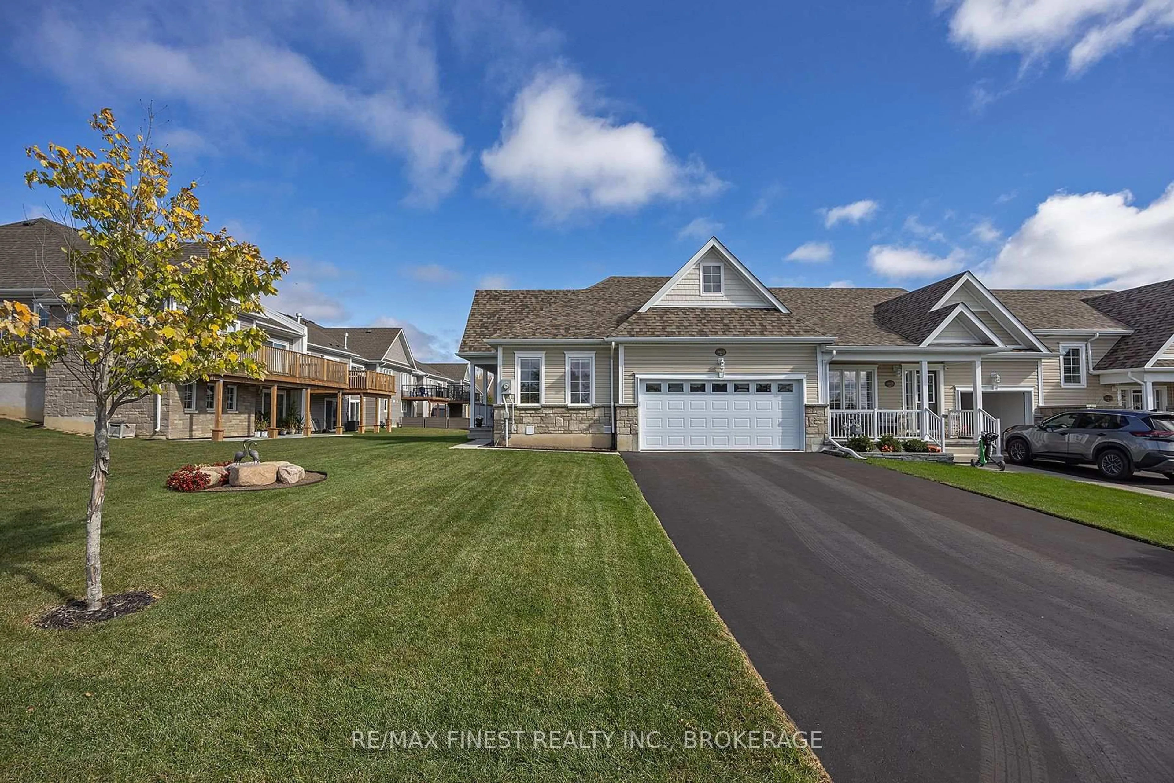 A pic from outside/outdoor area/front of a property/back of a property/a pic from drone, street for 460 Country Club Dr, Bath Ontario K0H 1G0