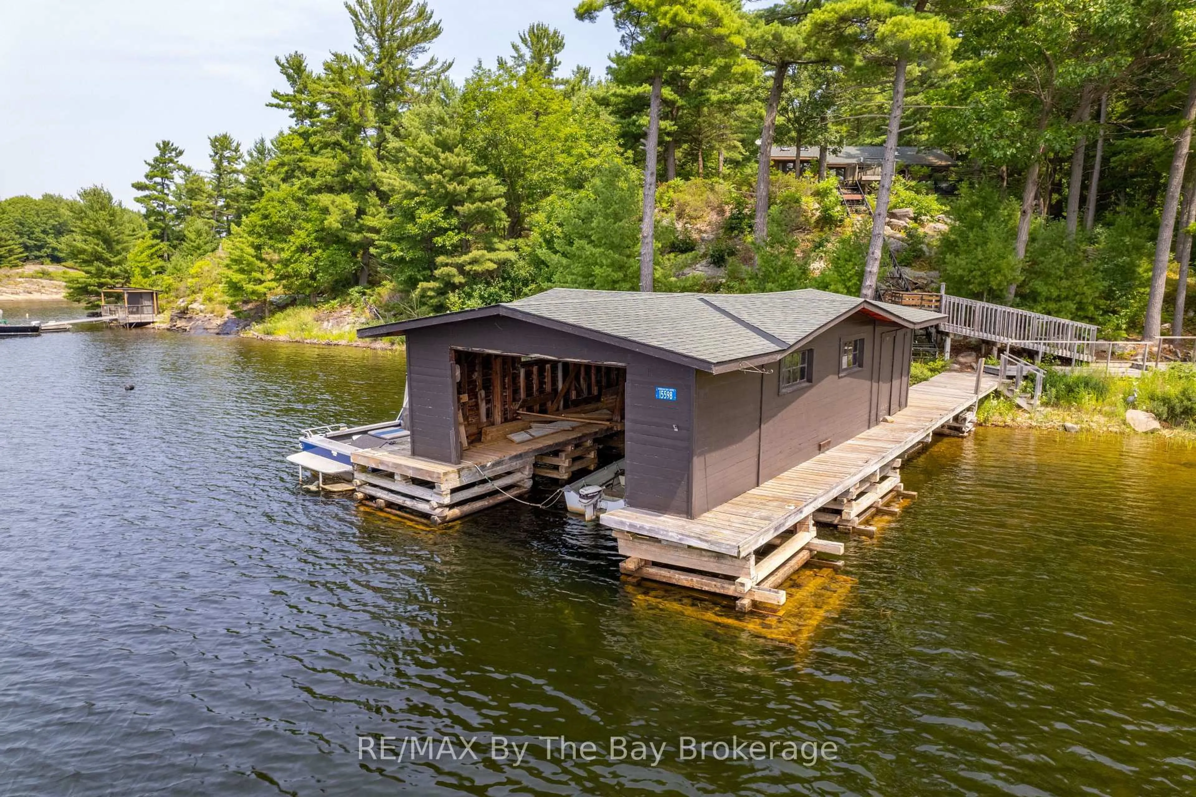 A pic from outside/outdoor area/front of a property/back of a property/a pic from drone, water/lake/river/ocean view for 15598 GEORGIAN BAY SHORE N/A, Georgian Bay Ontario P0E 1E0