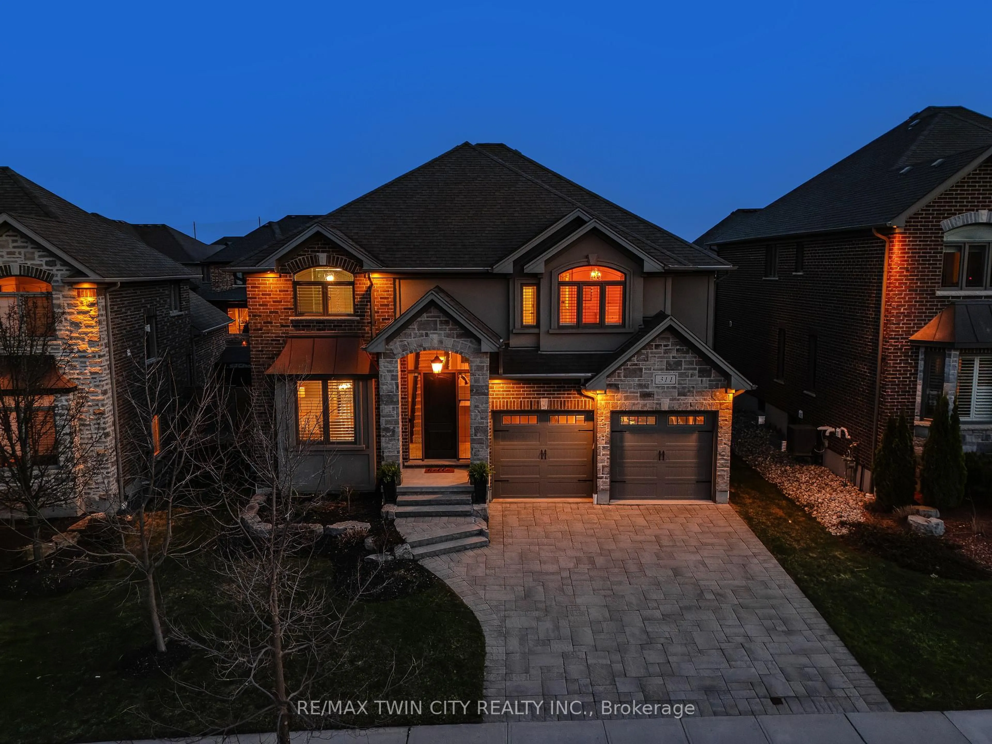Home with brick exterior material, street for 311 Deerfoot Tr, Waterloo Ontario N2K 0B3