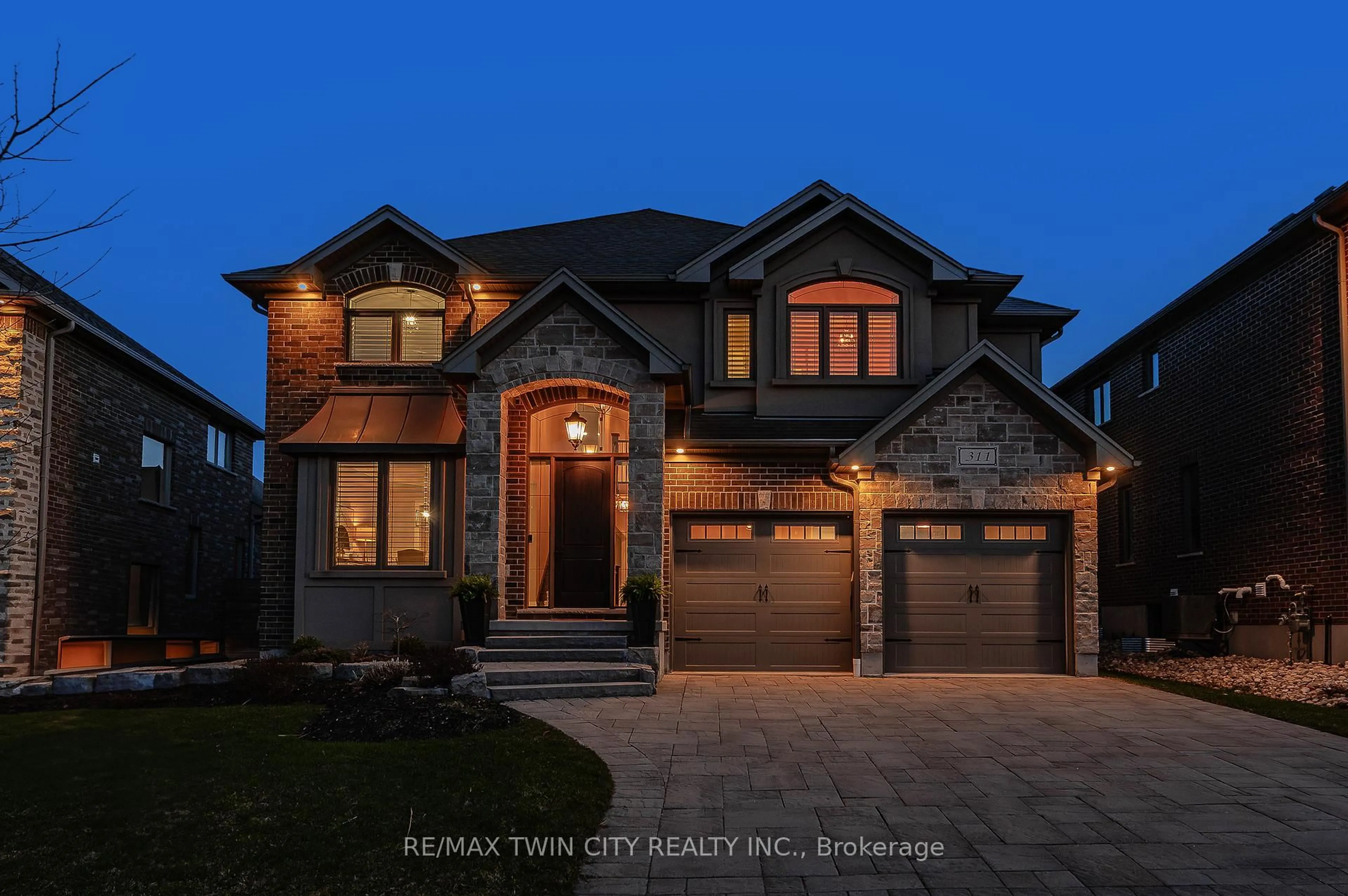 Home with brick exterior material, street for 311 Deerfoot Tr, Waterloo Ontario N2K 0B3