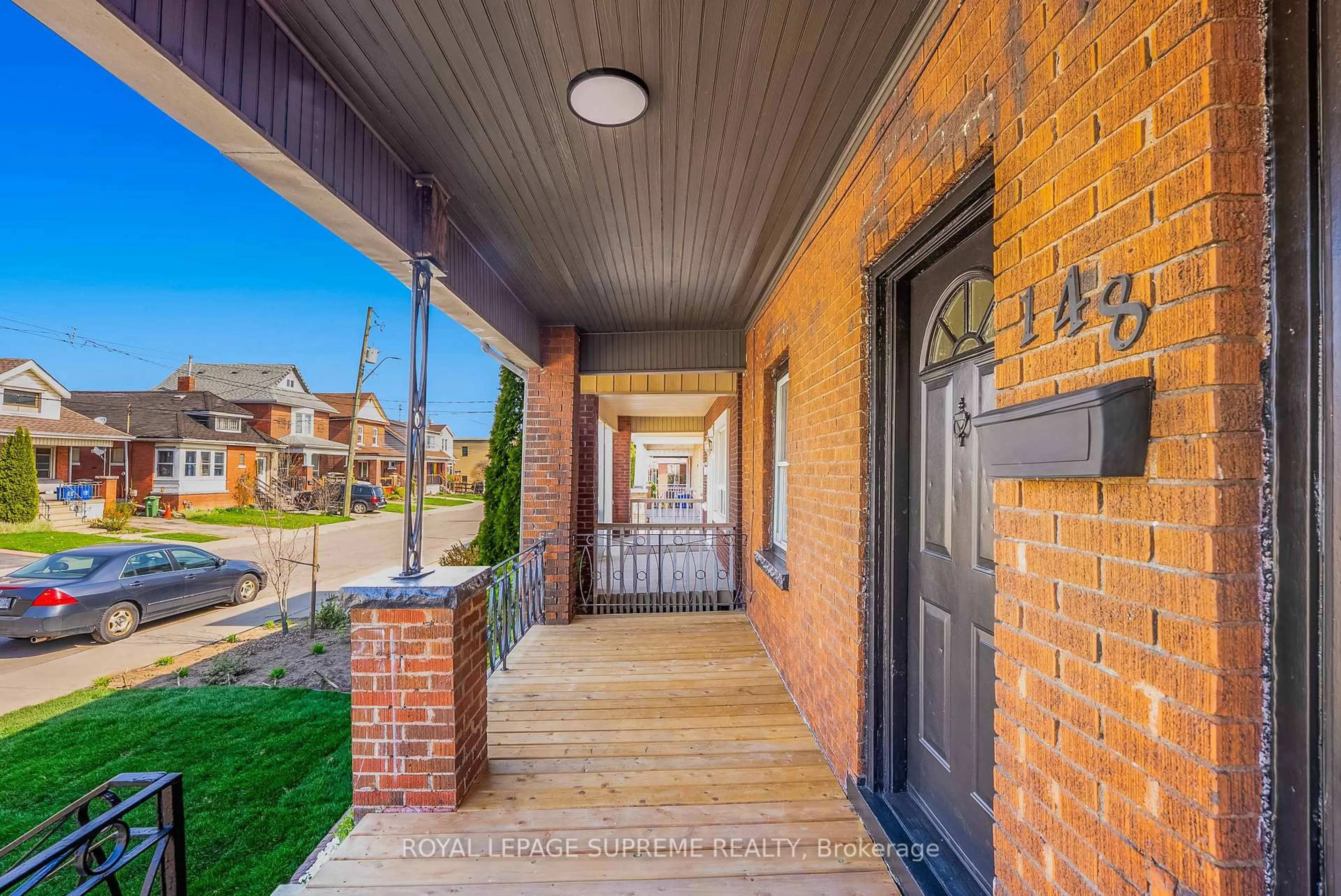 Home with brick exterior material, street for 148 Leinster Ave, Hamilton Ontario L8L 6X9