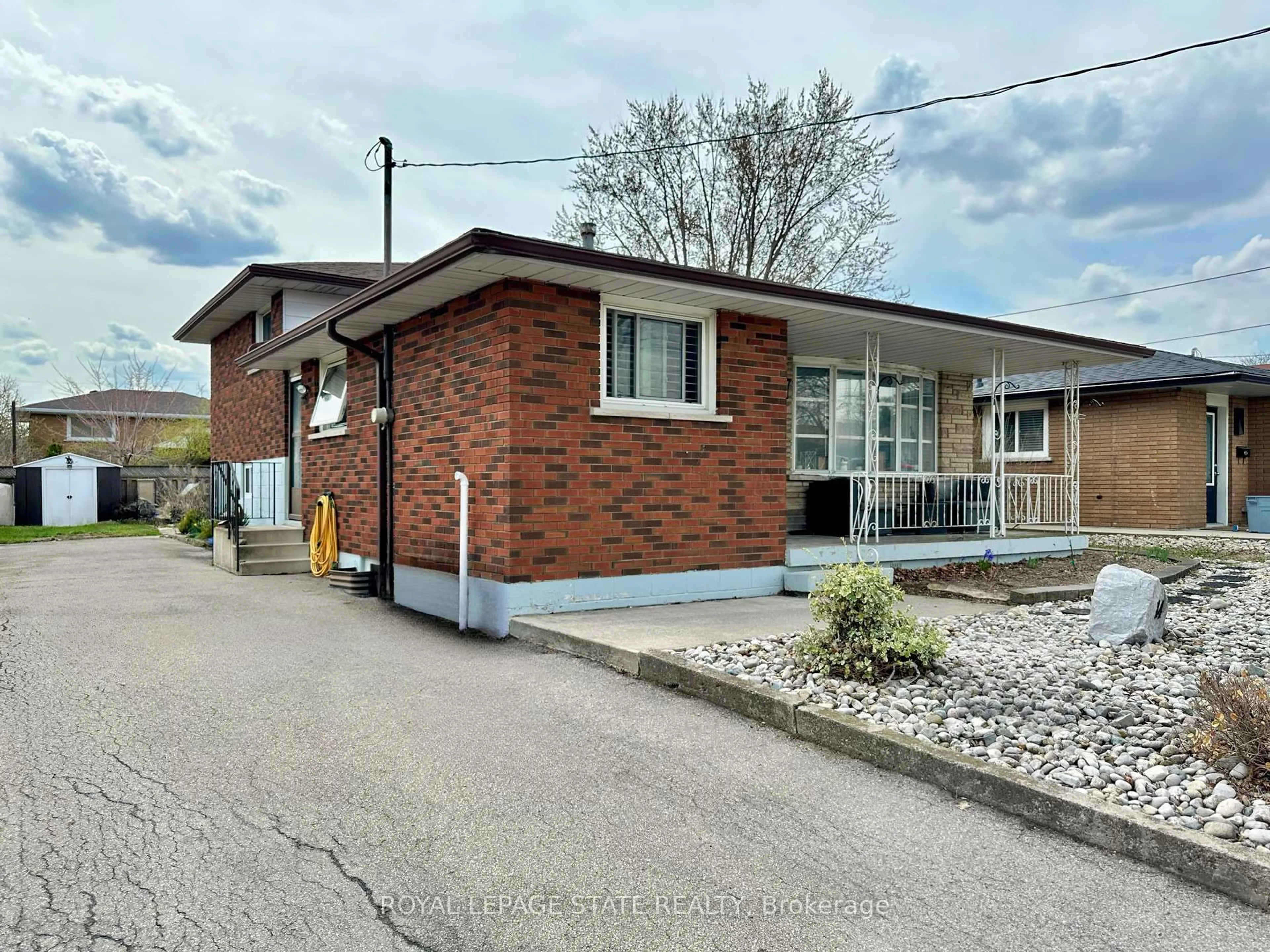 Home with brick exterior material, street for 14 Anson Ave, Hamilton Ontario L8T 2X3