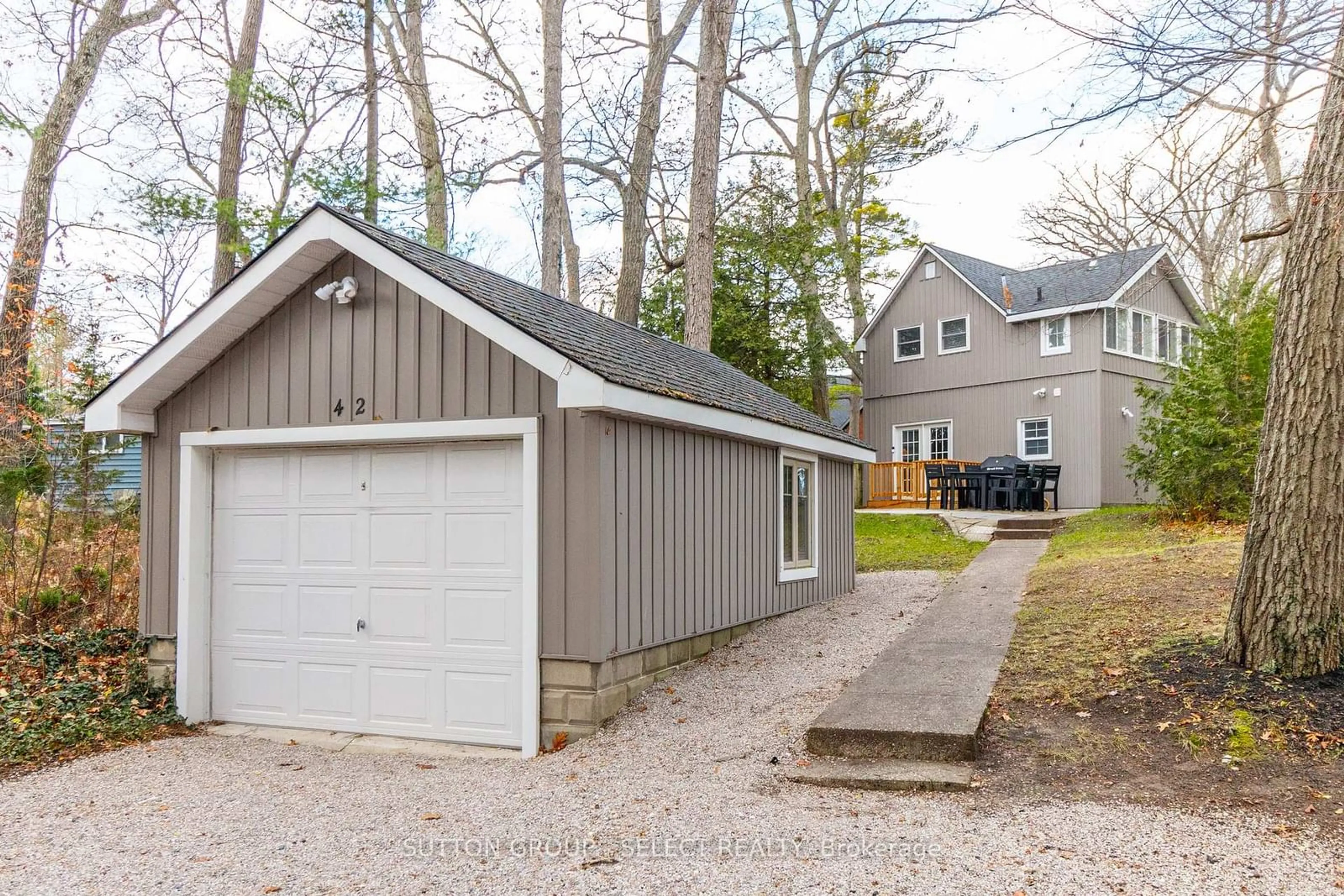 Home with vinyl exterior material, street for 42 SHORELINE Dr, Lambton Shores Ontario N0M 1T0