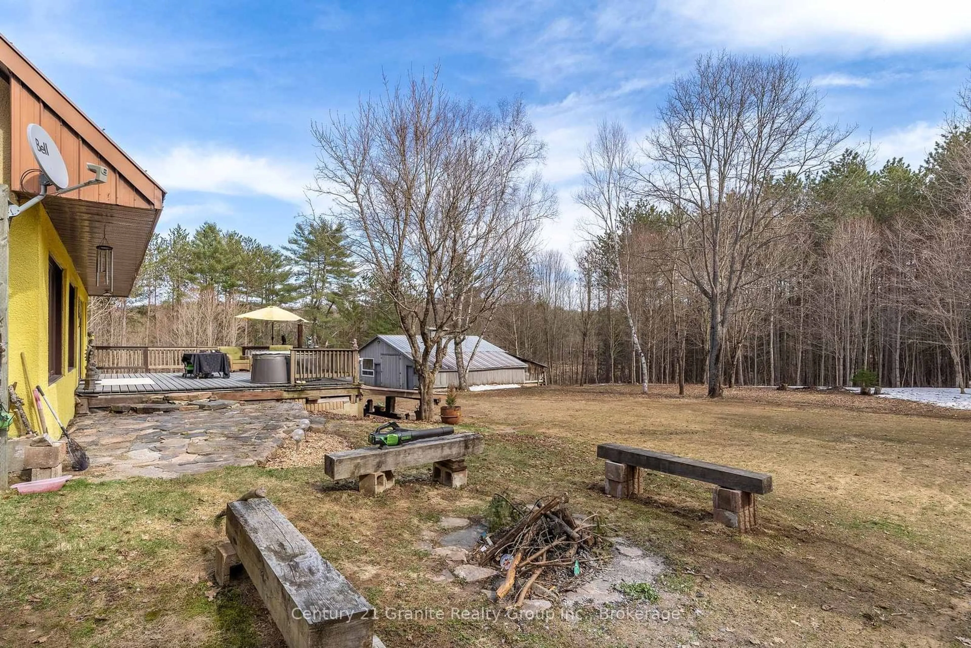 A pic from outside/outdoor area/front of a property/back of a property/a pic from drone, forest/trees view for 1093 Kushog Lake Rd, Minden Hills Ontario K0M 2K0