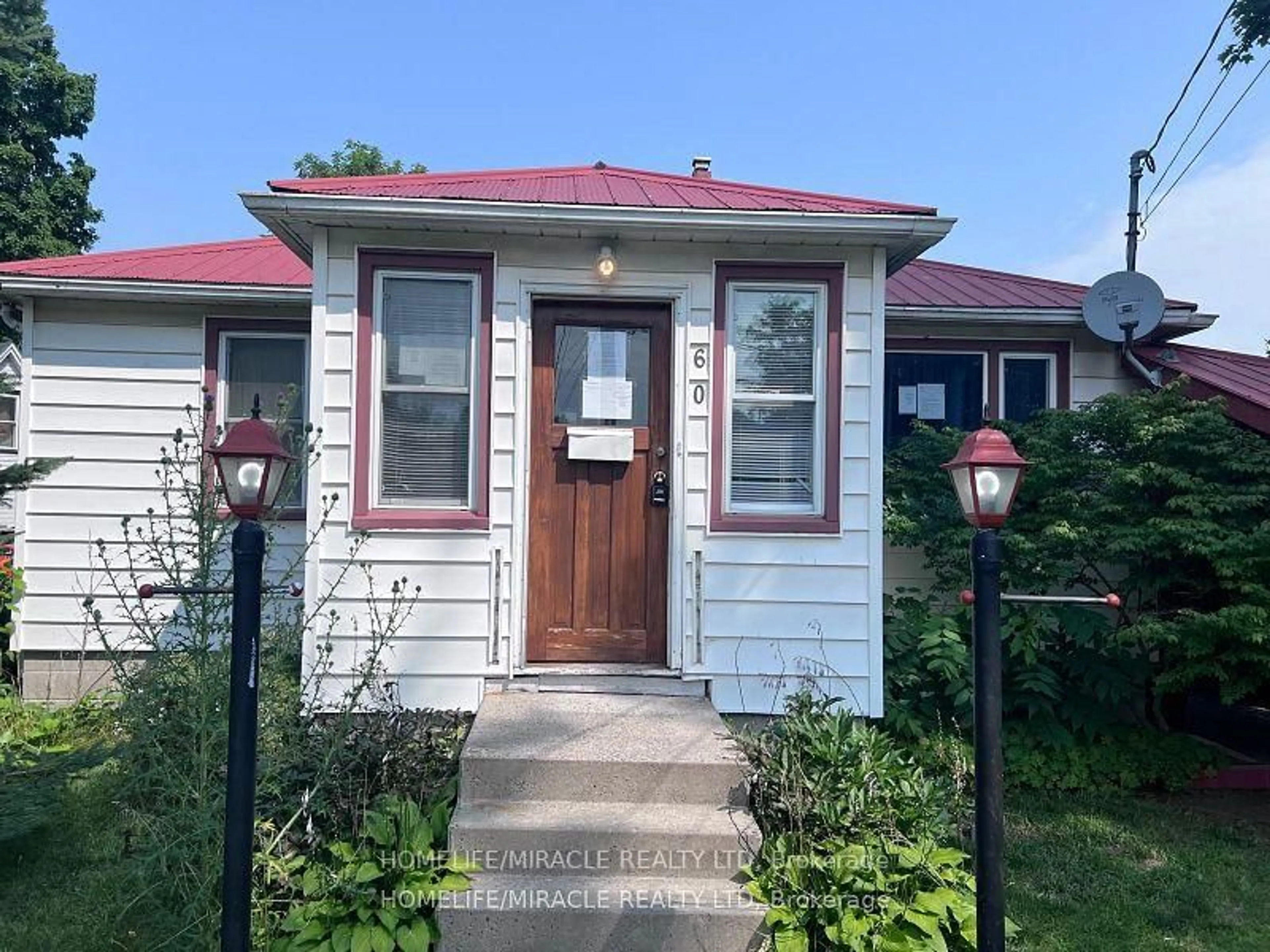 Home with vinyl exterior material, street for 60 Lewis St, Belleville Ontario K8P 1R3