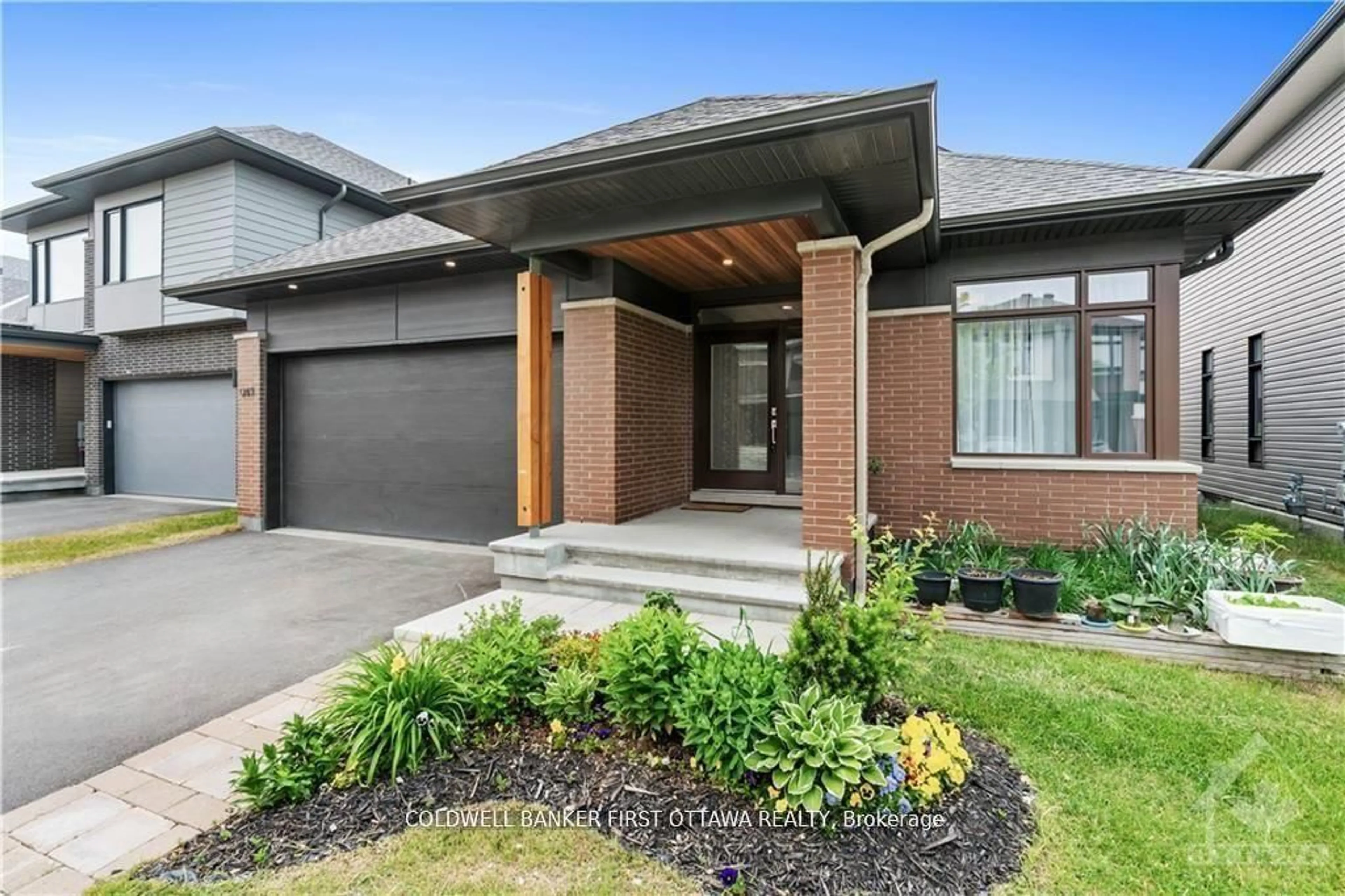 Home with brick exterior material, street for 945 ISLINGTON Way, Ottawa Ontario K1T 0T7