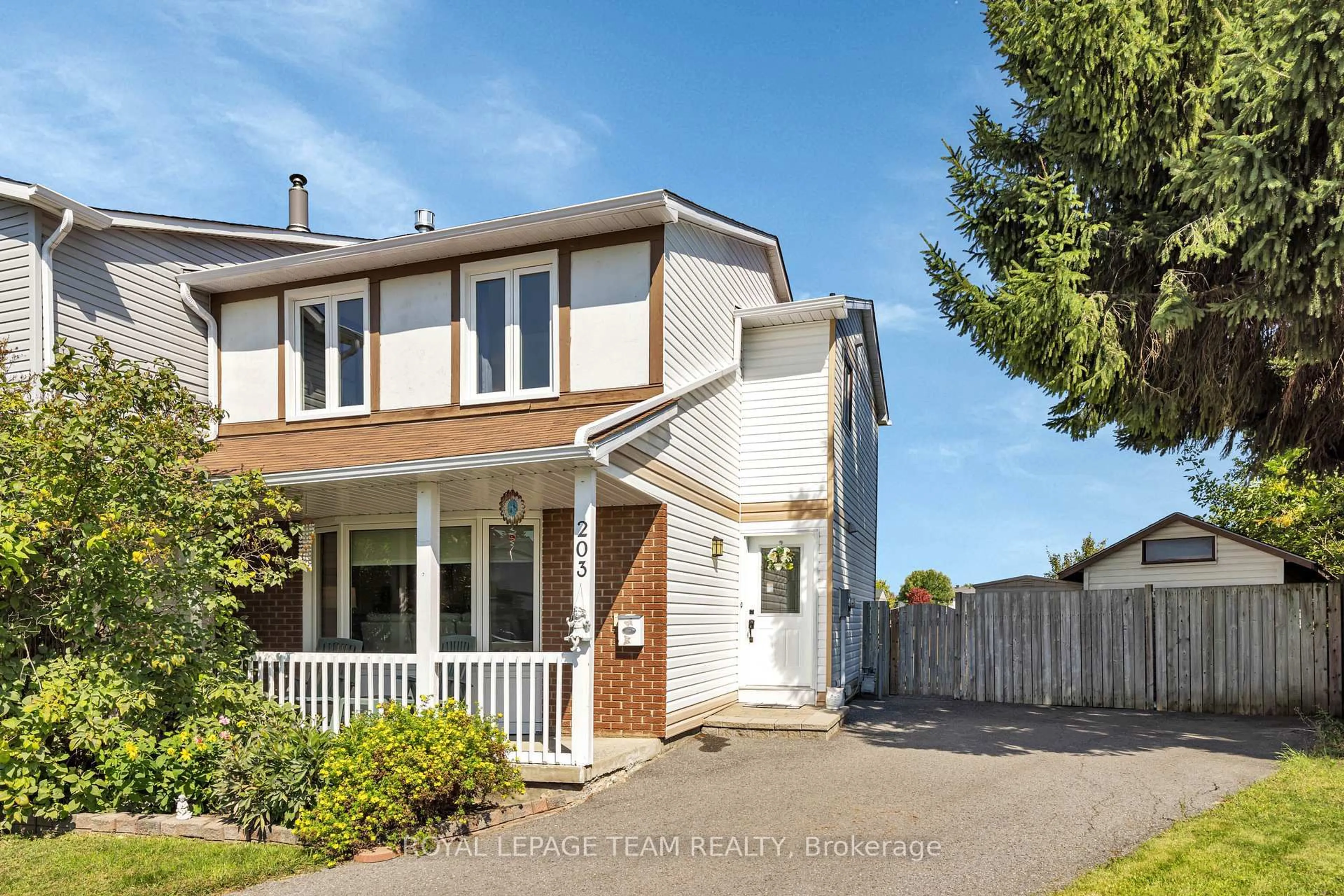 Home with vinyl exterior material, street for 203 Rosemary Gdns, Ottawa Ontario K1E 1Y9