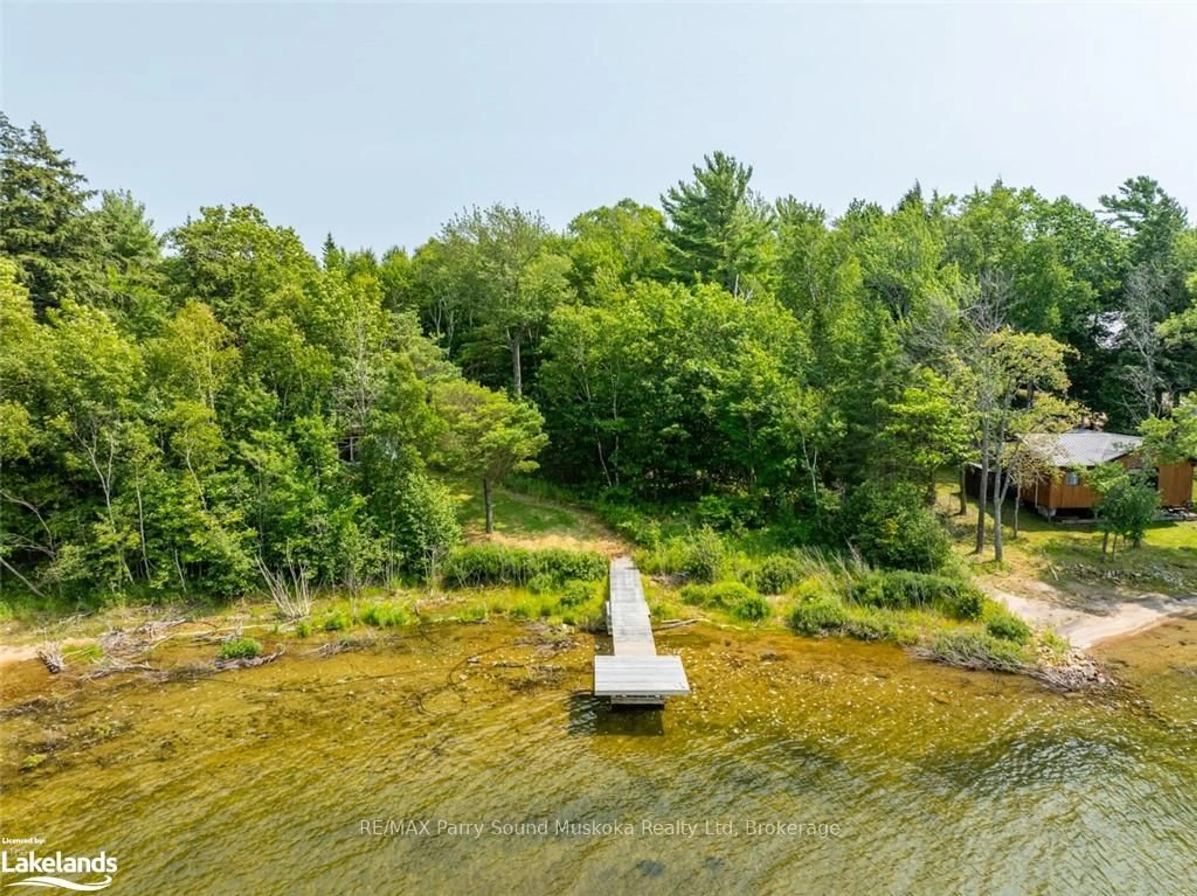 A pic from outside/outdoor area/front of a property/back of a property/a pic from drone, water/lake/river/ocean view for 12 LINDA Lane, Carling Ontario P0G 1G0