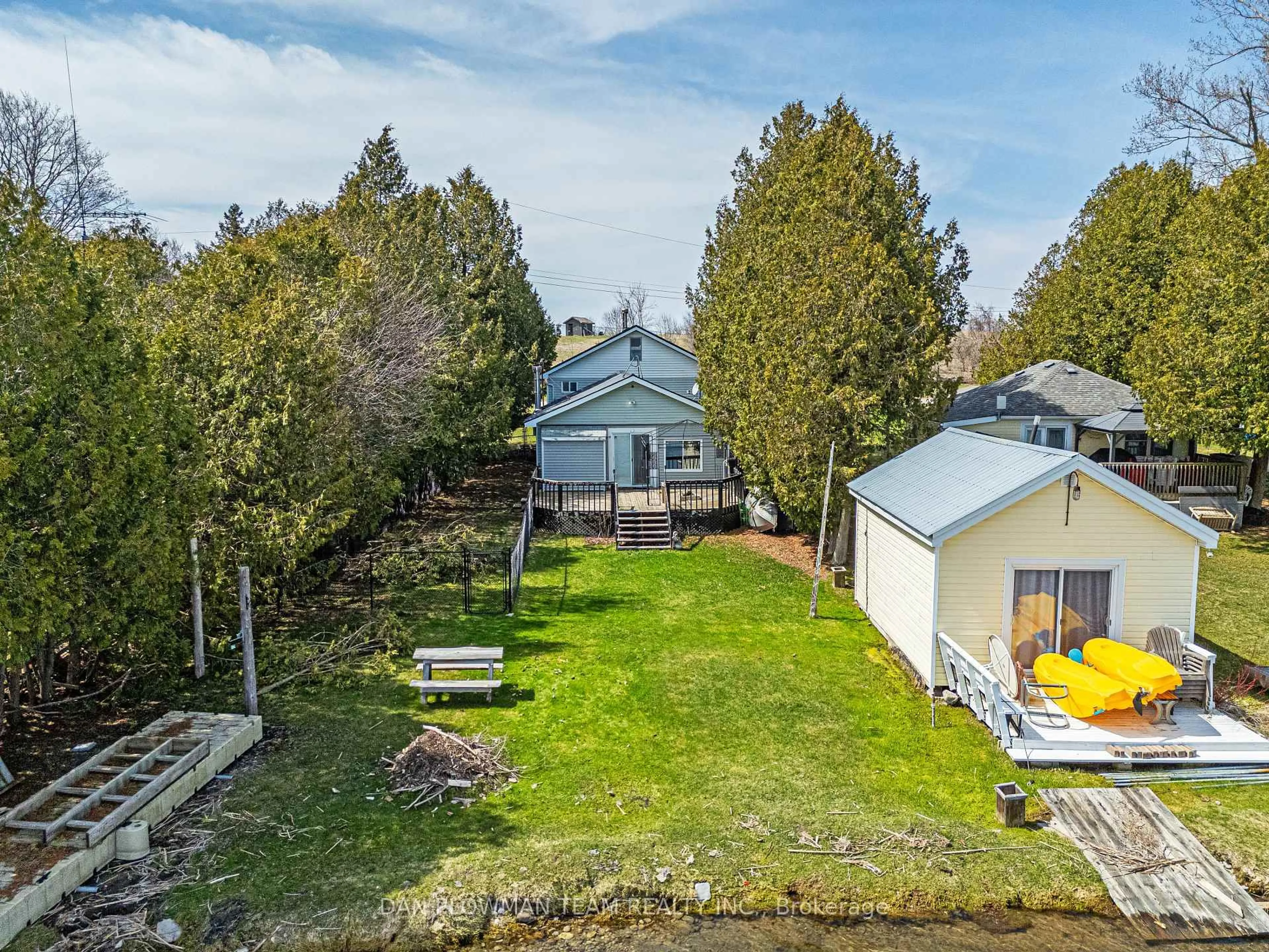 A pic from outside/outdoor area/front of a property/back of a property/a pic from drone, water/lake/river/ocean view for 32 Beach Rd, Kawartha Lakes Ontario K0M 2C0