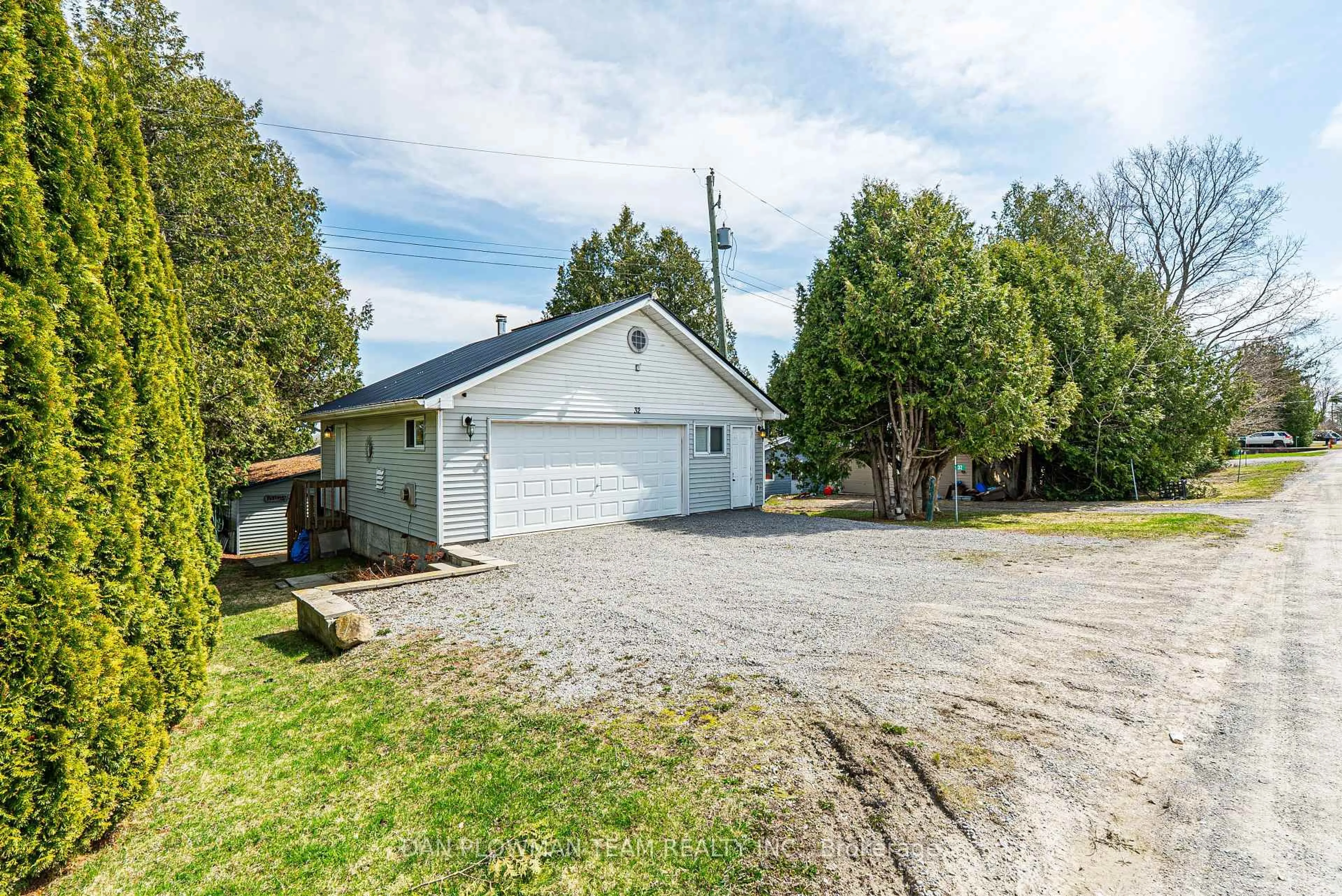 A pic from outside/outdoor area/front of a property/back of a property/a pic from drone, street for 32 Beach Rd, Kawartha Lakes Ontario K0M 2C0