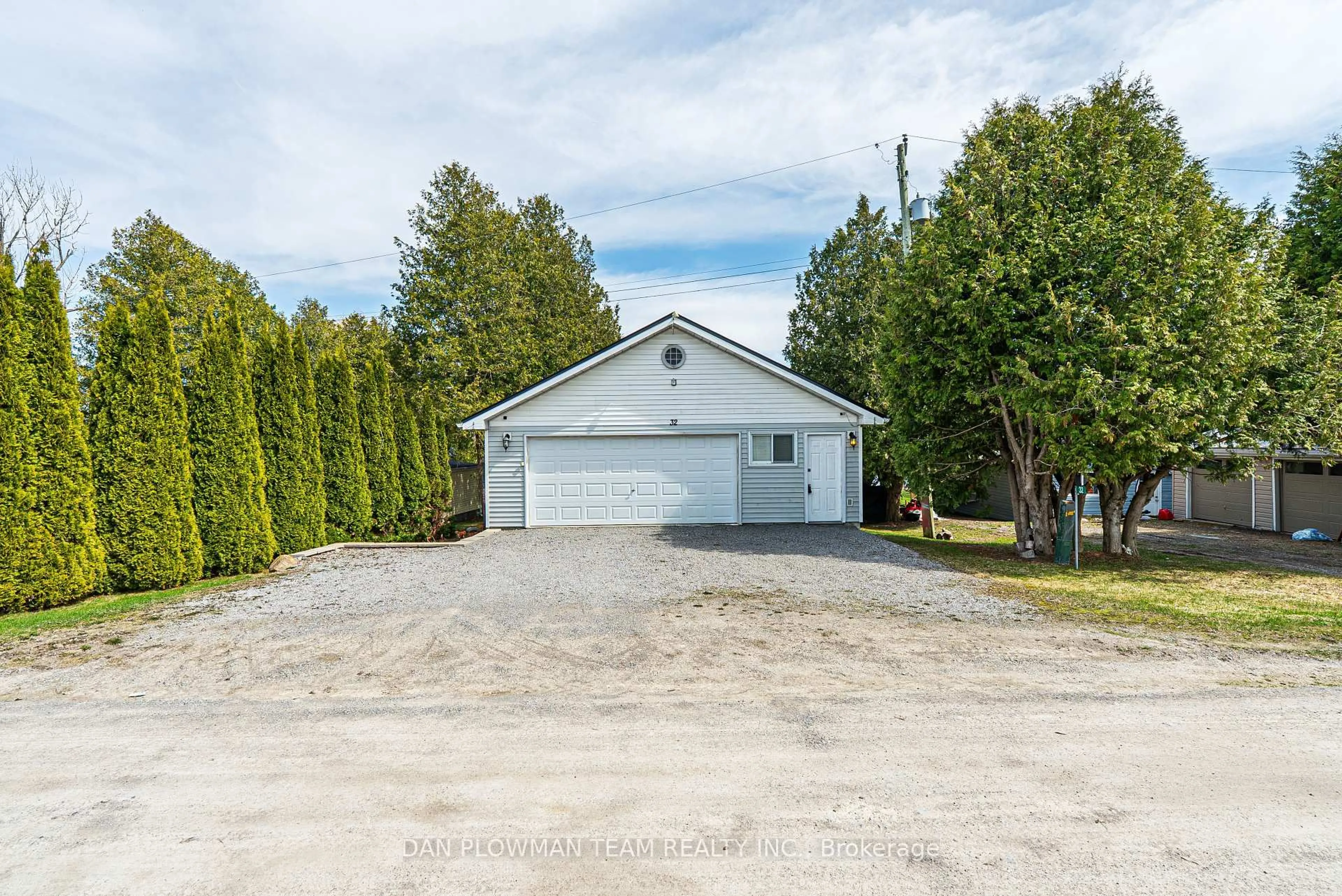 A pic from outside/outdoor area/front of a property/back of a property/a pic from drone, unknown for 32 Beach Rd, Kawartha Lakes Ontario K0M 2C0