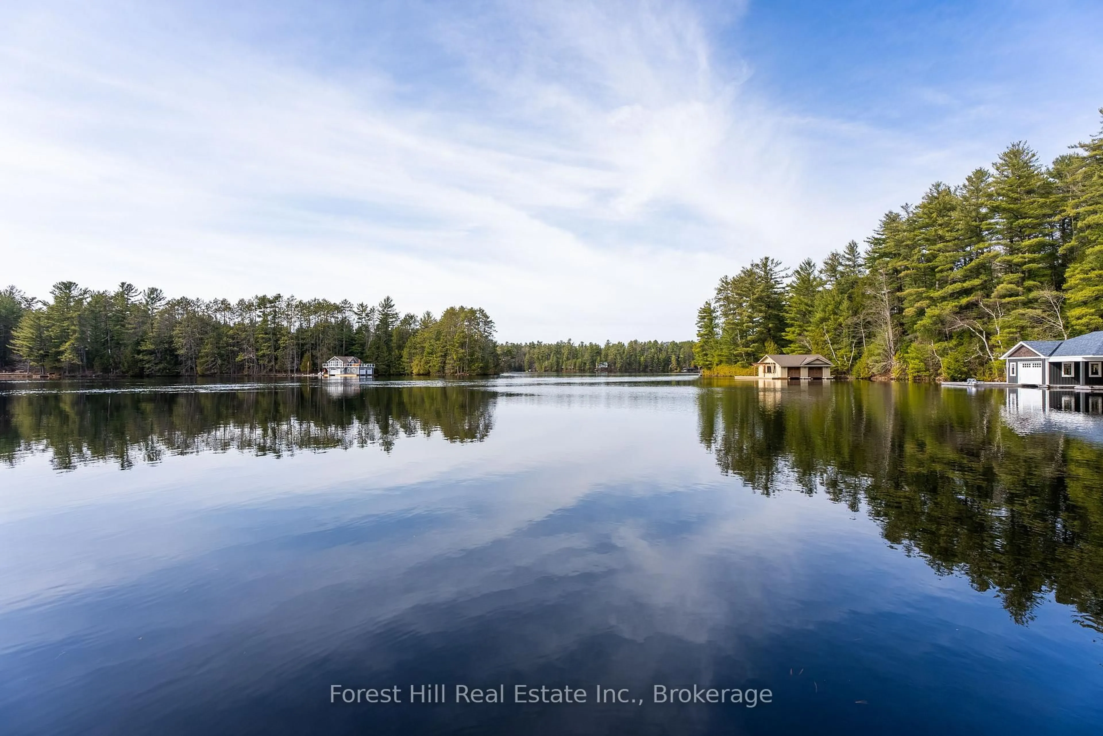 A pic from outside/outdoor area/front of a property/back of a property/a pic from drone, water/lake/river/ocean view for 1006 Kings Way, Lake of Bays Ontario P0B 1A0