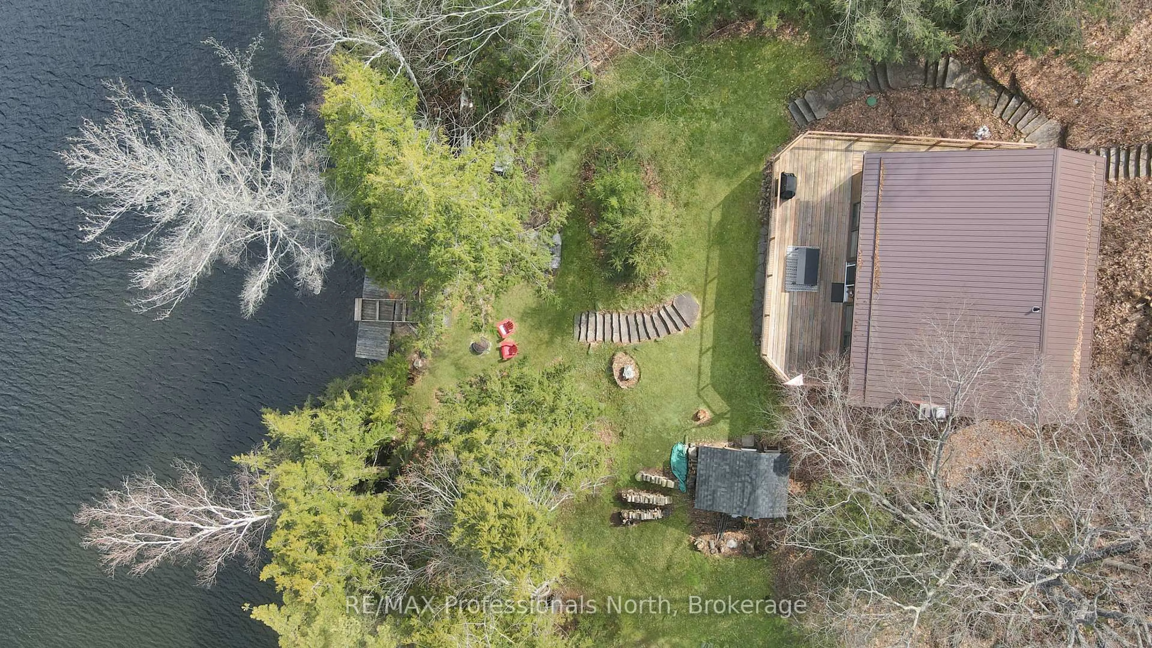 A pic from outside/outdoor area/front of a property/back of a property/a pic from drone, forest/trees view for 1564 Parsons Rd, Dysart et al Ontario K0M 1S0