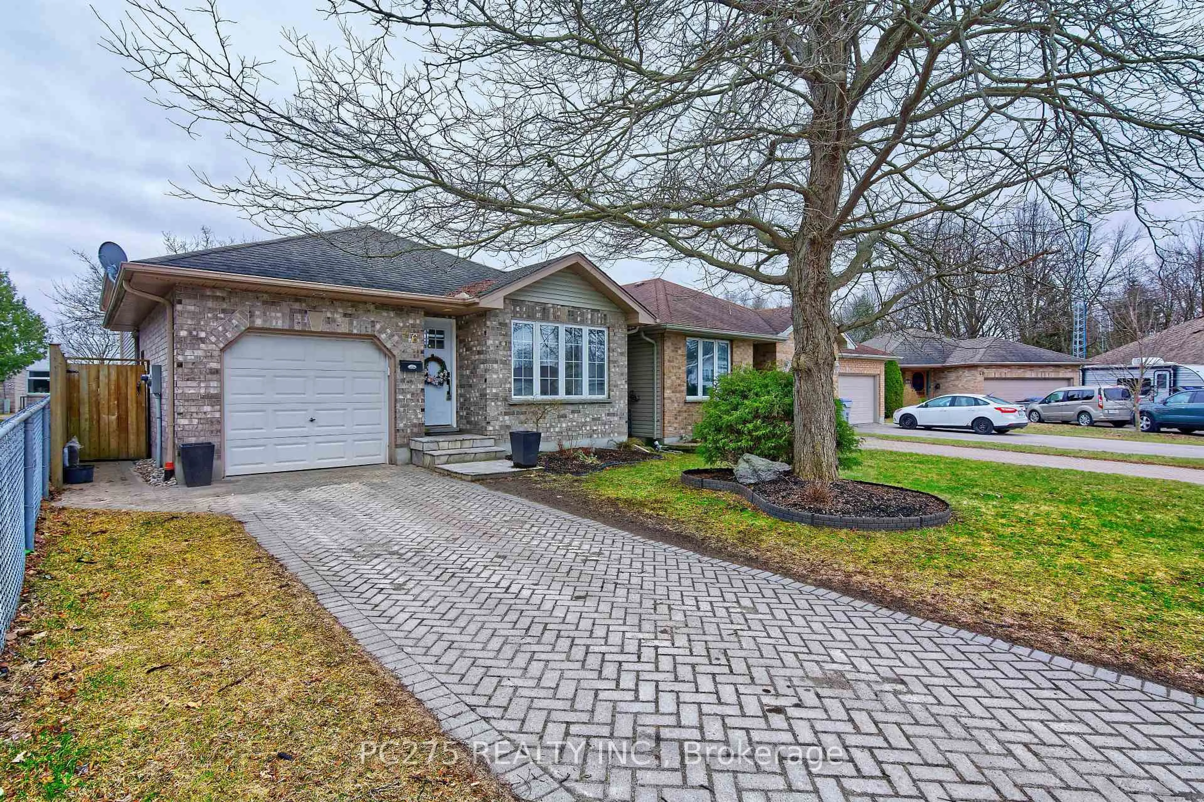 Home with brick exterior material, street for 46 Dell Dr, Strathroy-Caradoc Ontario N7G 4B6